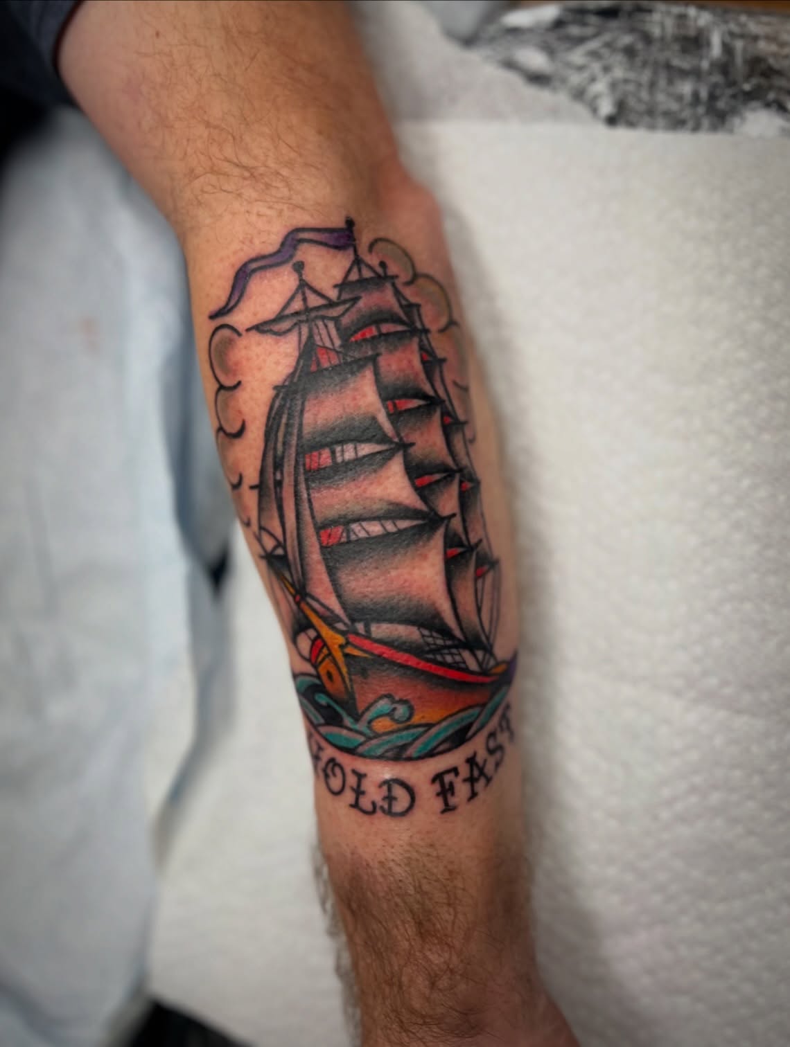 Sailboat American traditional tattoo on the forearm by Shannon Pagliarini