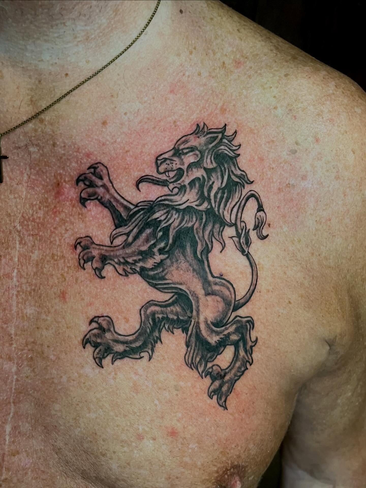 Lion black and grey tattoo on the chest by Lenny Paul - Ohio Tattoo Artist, Canton, Ohio