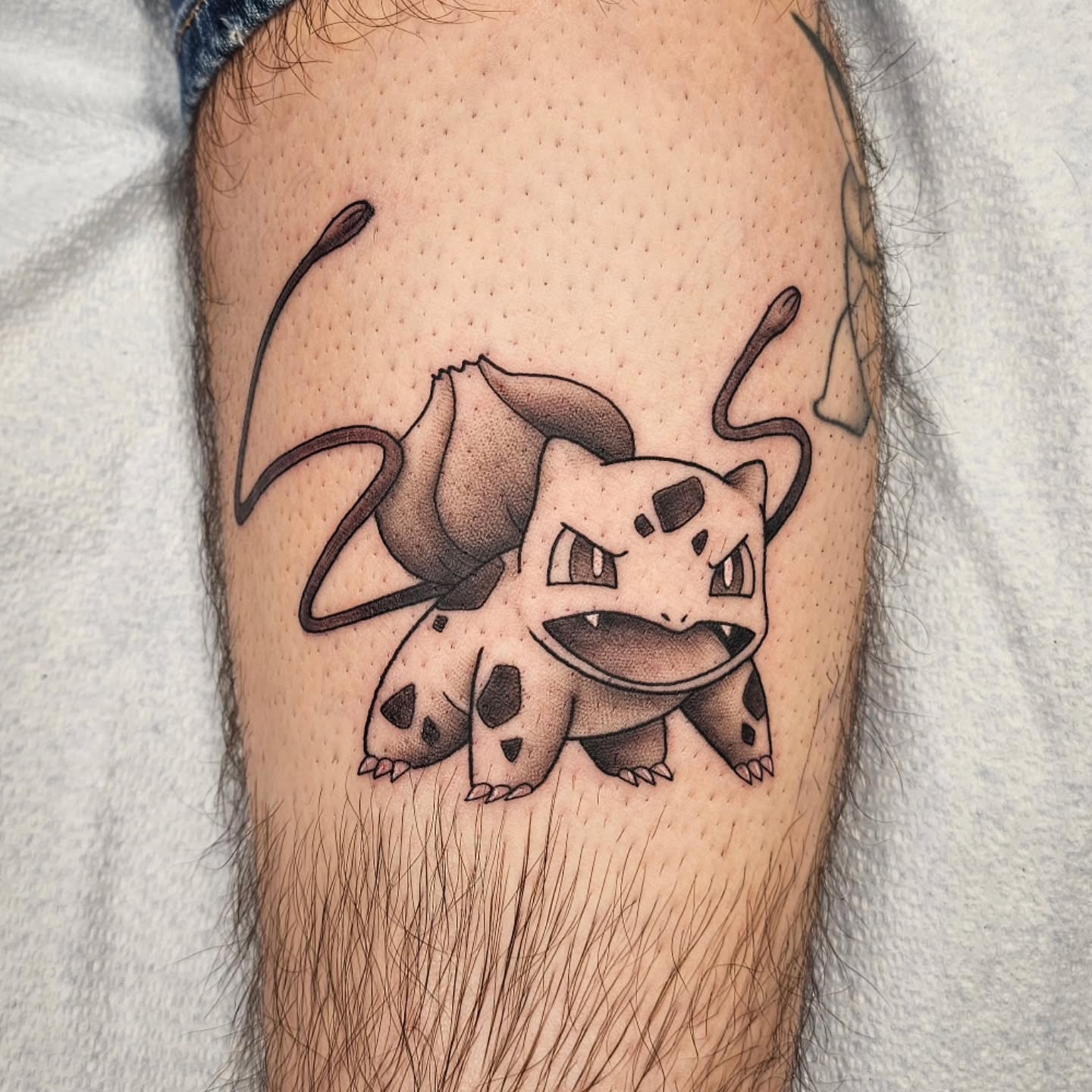 Bulbasaur black and grey tattoo on the forearm by πππ¦ππ§ππ‘π ππ¨ππππππ’π§π¨'π¬ πππππ¨π¨π¬