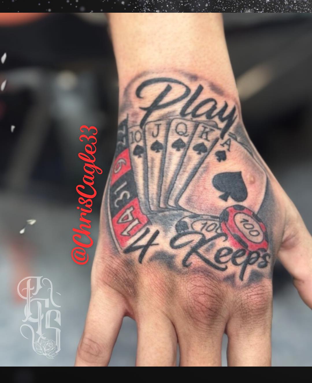 Playing cards and poker chip realism tattoo on the hand by Faithful Tattoo Studio