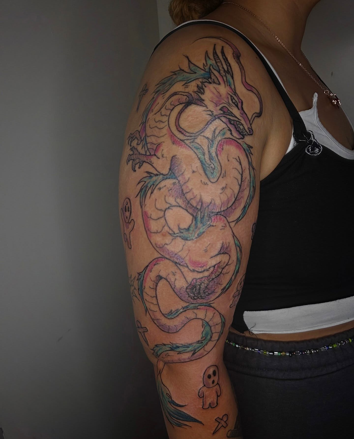 Dragon dotwork tattoo on the upper arm by julian