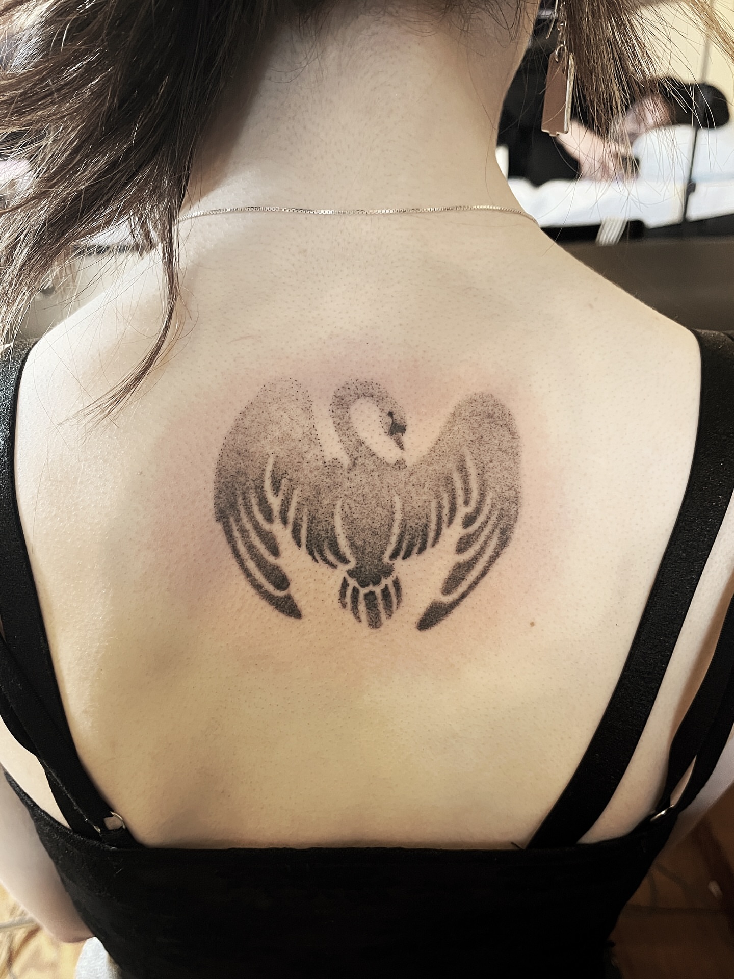 Swan black and grey tattoo on the back by Risa Cincinnati Tattoo Artist