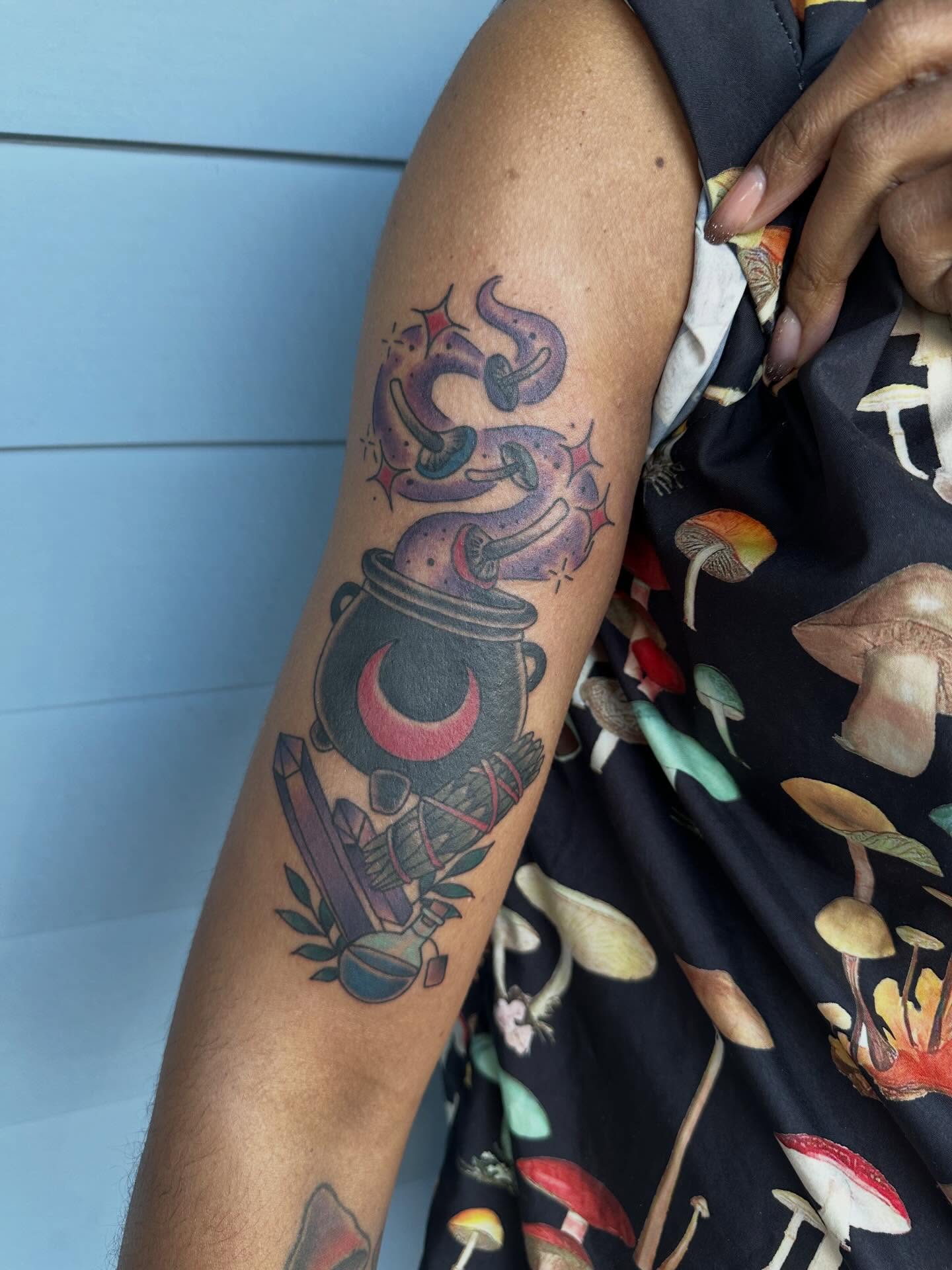 Cauldron and mushrooms American traditional tattoo on the forearm by Whitney Creep Tattoos