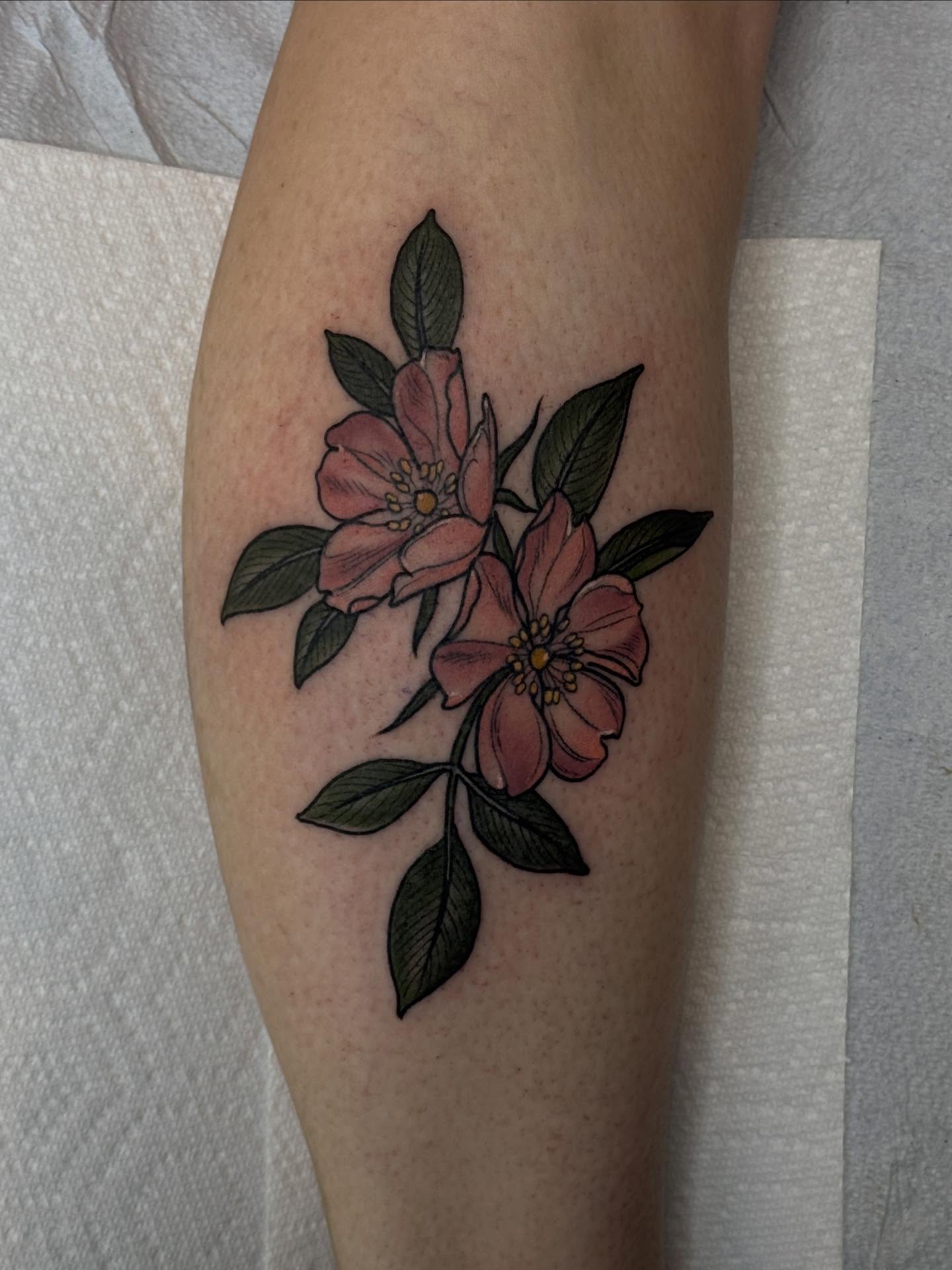 Flowers new school tattoo on the forearm by Rachael Shelly