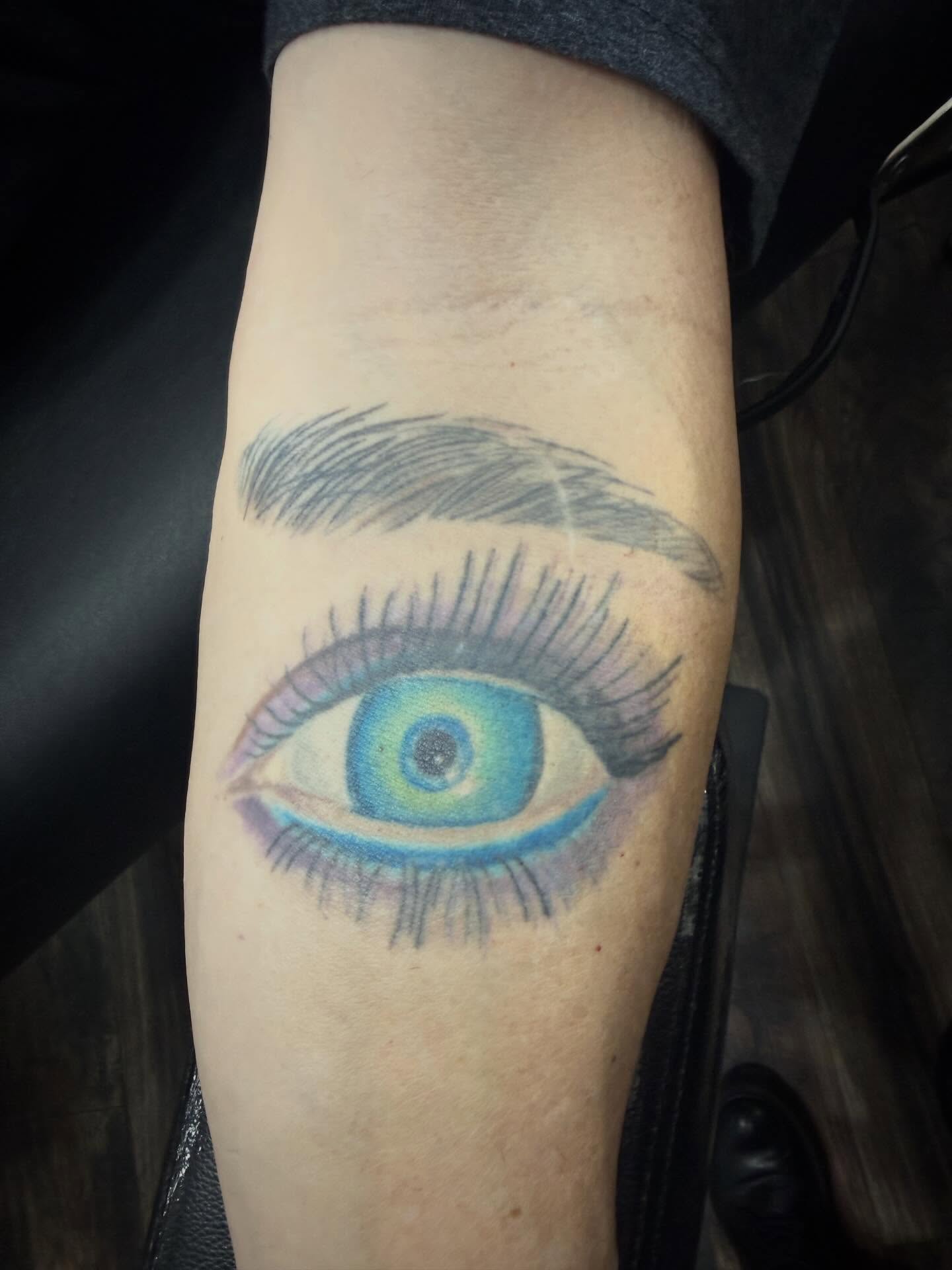 Eye realism tattoo on the forearm by Abby Hofman