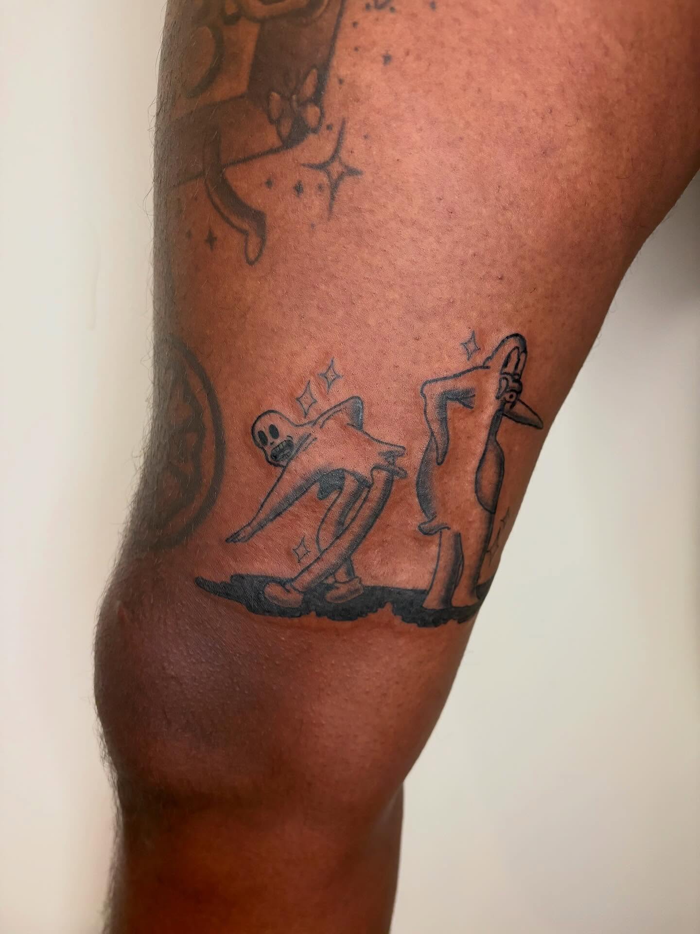 Skeleton surfing black and grey tattoo on the forearm by Fin :