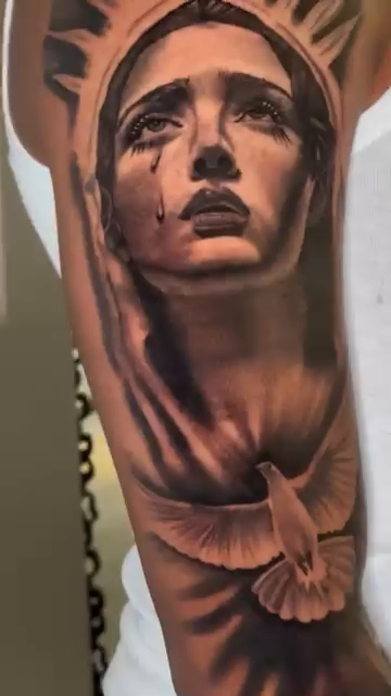 Woman with dove realism tattoo by Henry Fuentes