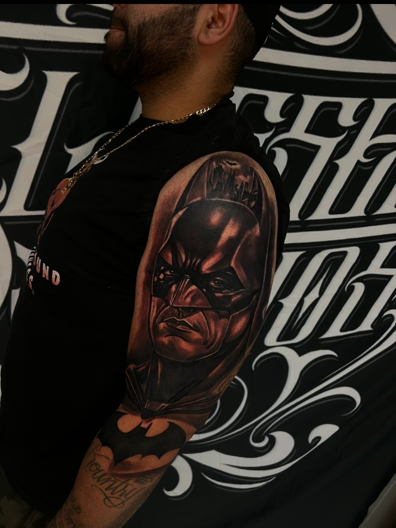 Batman realism tattoo on the forearm by Daniel Michael Perez