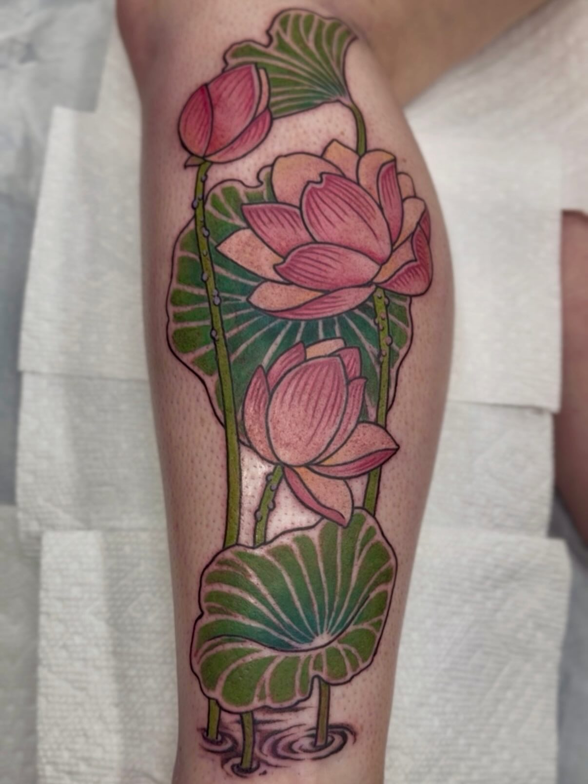 Lotus flowers dotwork tattoo on the forearm by English Cousins, Nashville, Tennessee
