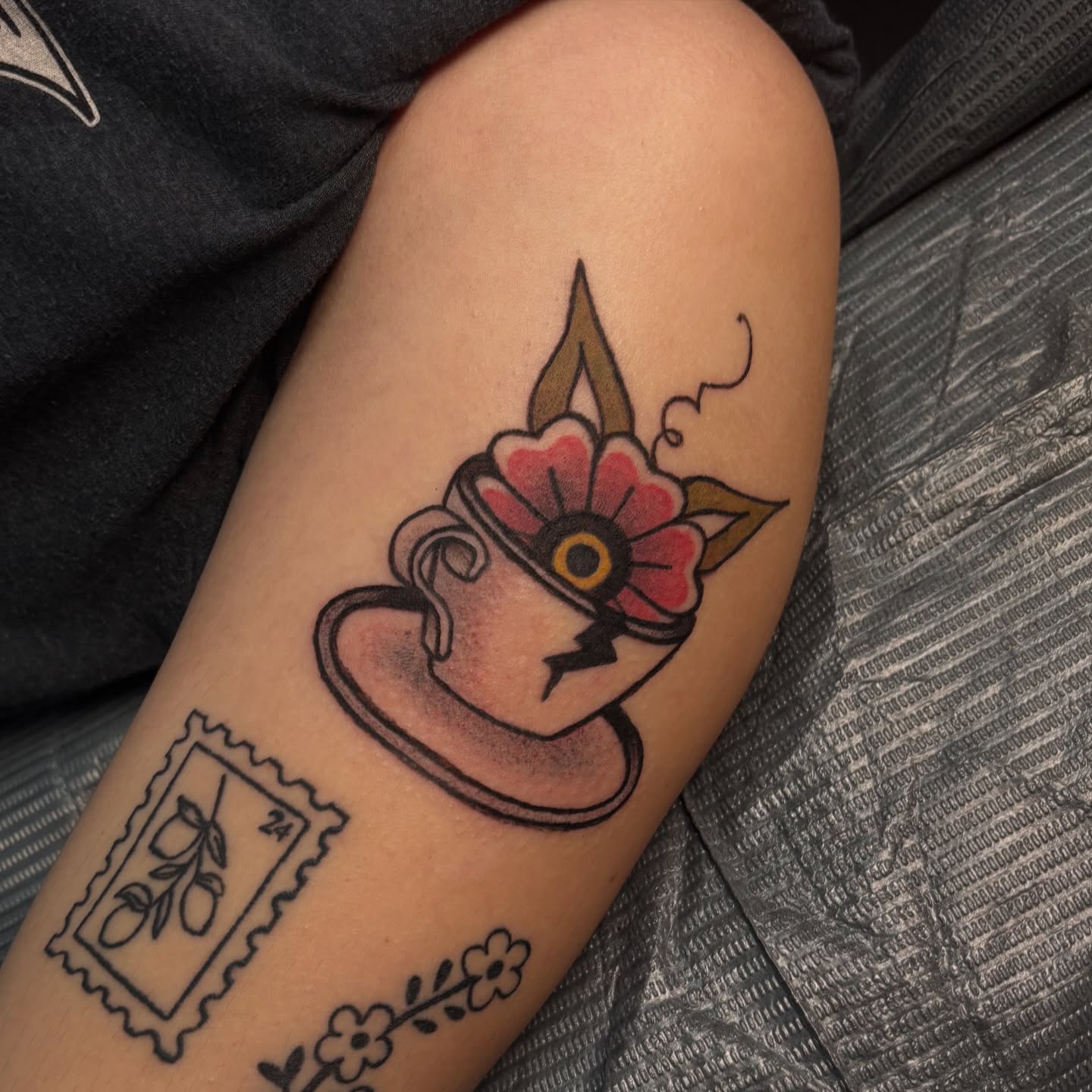 Flower cup American traditional tattoo on the forearm by Rachel