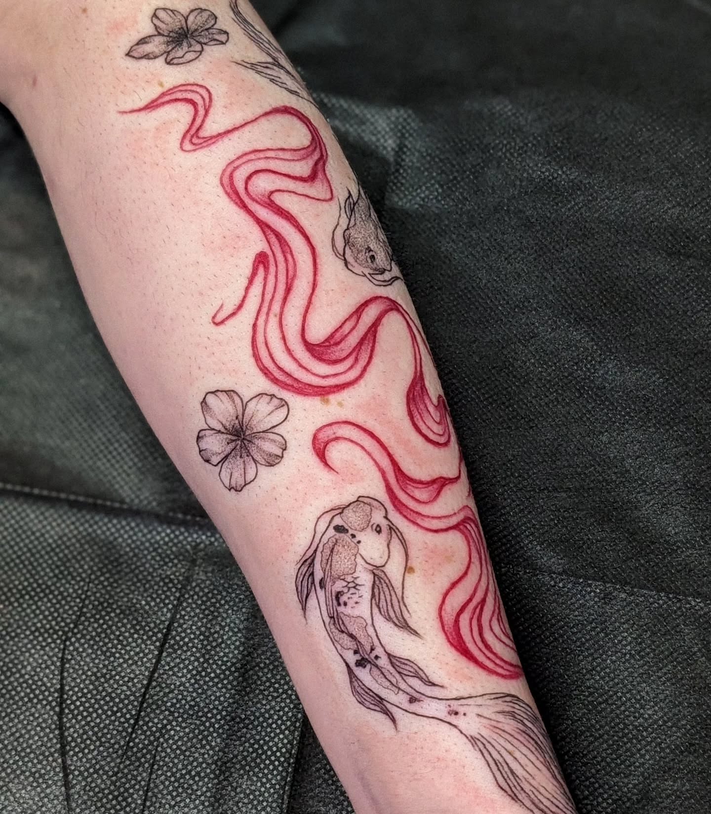 Snake and flowers dotwork tattoo on the forearm by robin ✨ portland tattoo artist