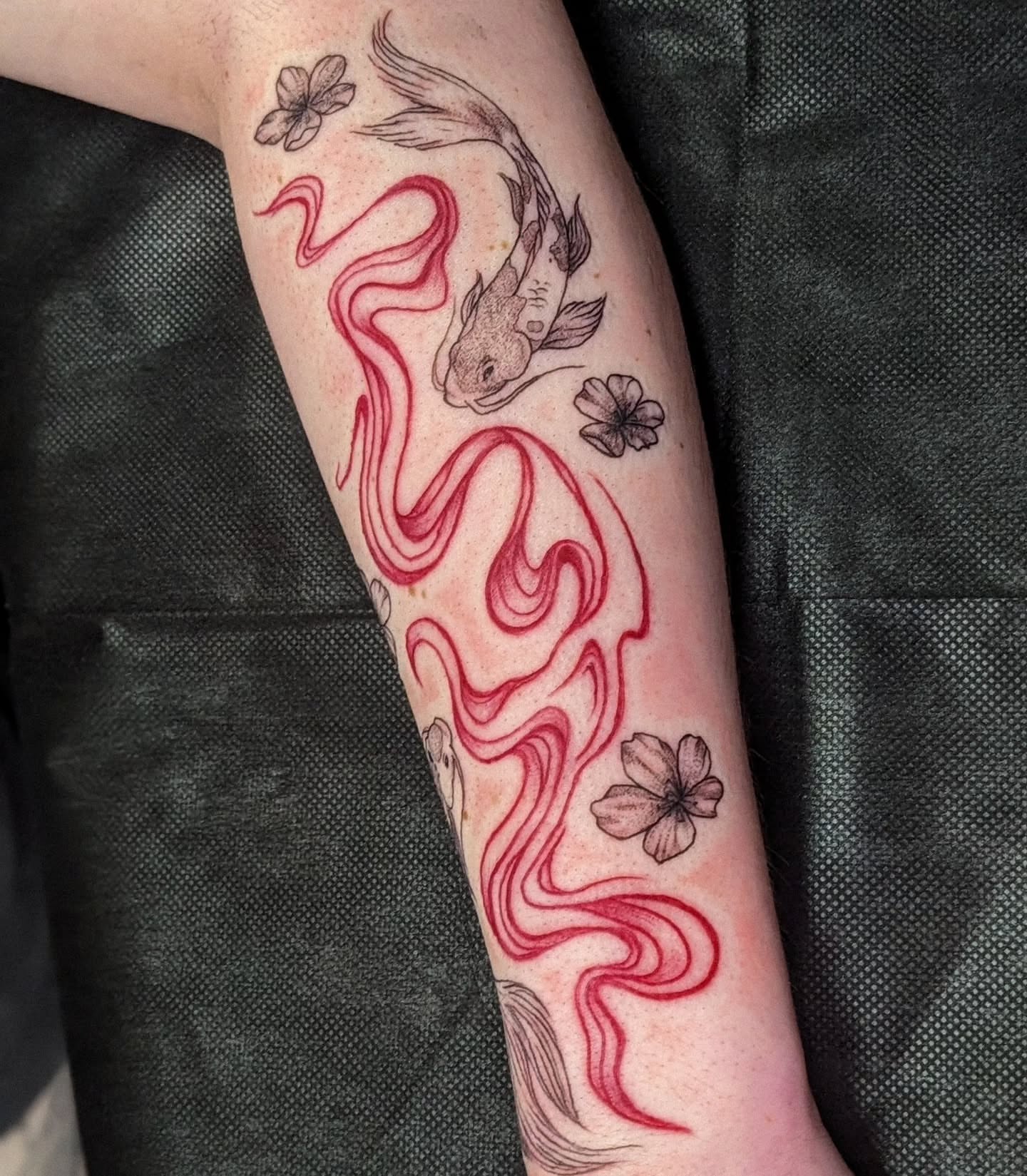 Koi fish and cherry blossoms japanese irezumi tattoo on the forearm by robin ✨ portland tattoo artist