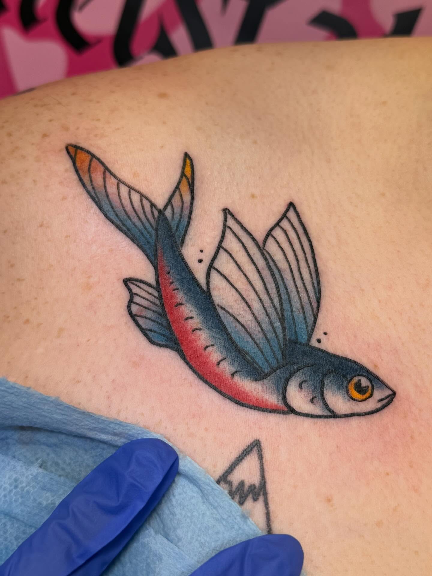 Flying fish American traditional tattoo on the shoulder by Chelsea Graham, Seattle, Washington