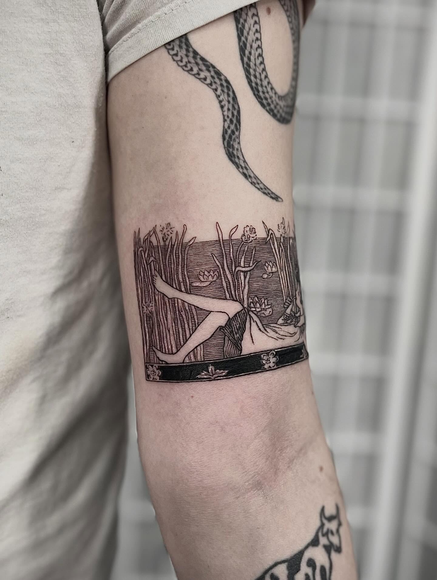 Woman in reeds realism tattoo on the forearm by Tattoo Artist