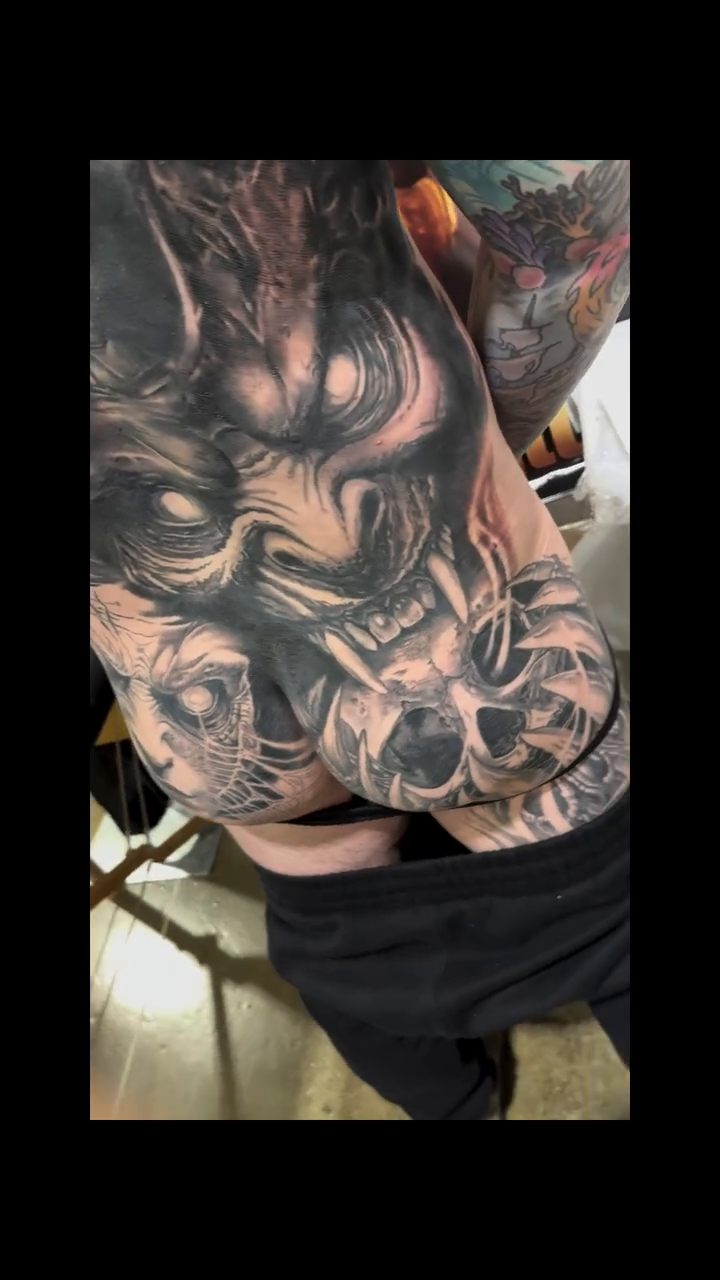 Skull and demonic figures realism tattoo by Steve Bishov