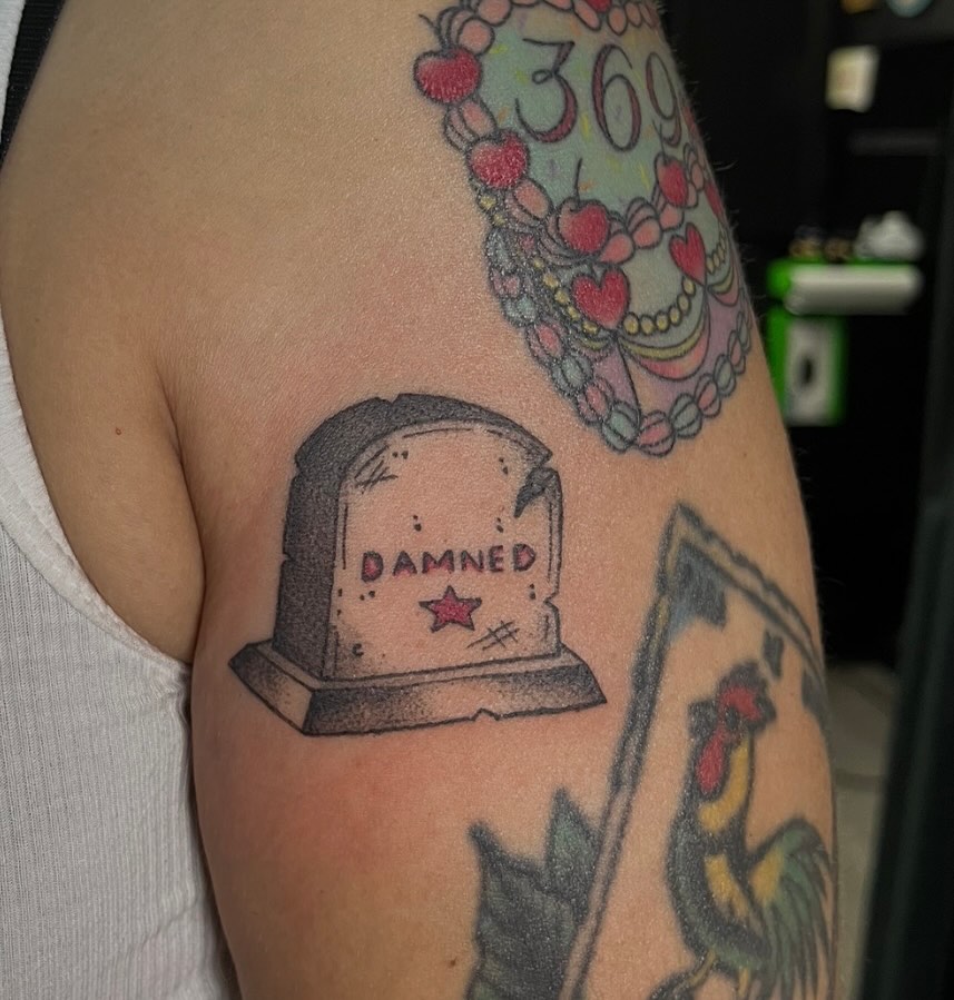 Grave marker American traditional tattoo on the upper arm by LooSid