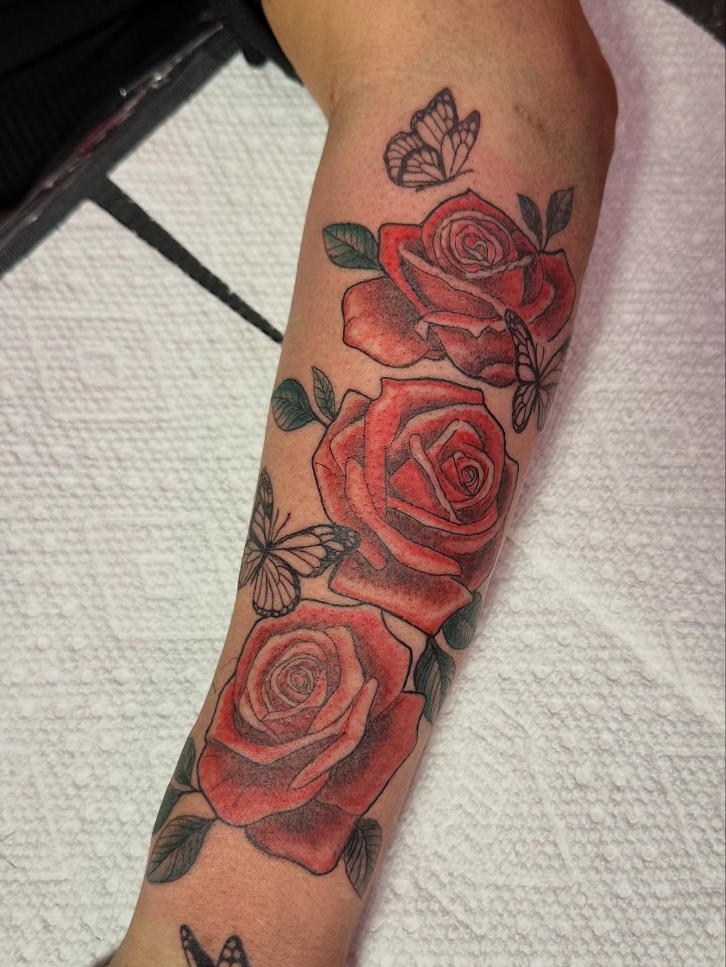 Roses and butterflies realism tattoo on the forearm by π·πππ, Cleveland, Ohio