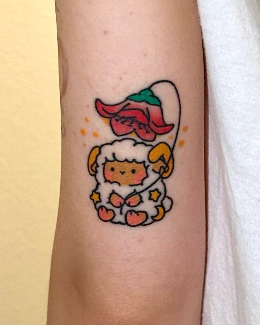 Sheep with flower new school tattoo on the forearm by XINAMON 🔥 시나몬