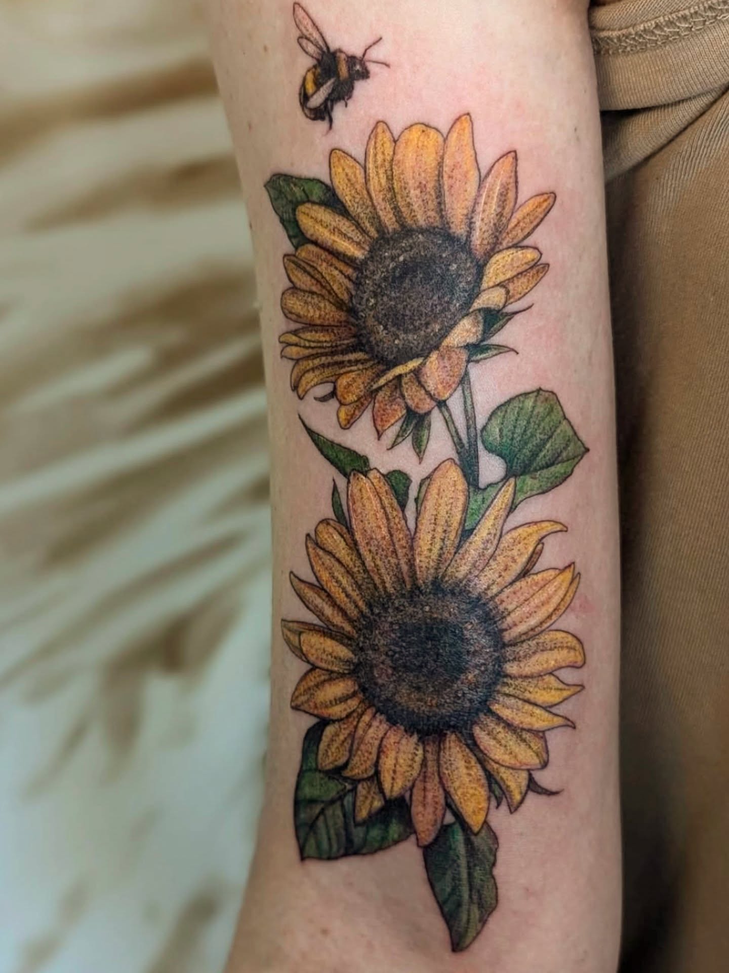 Sunflowers and bee dotwork tattoo on the forearm by 💎 Neon
