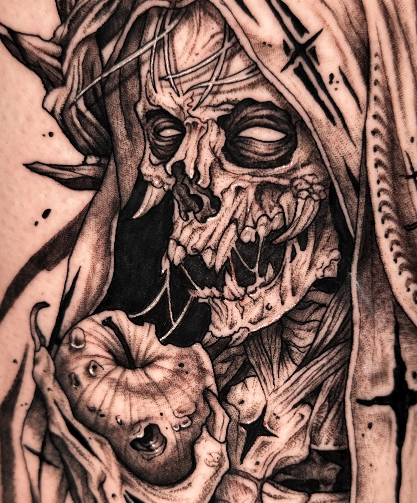 Skull and worm dark realism tattoo on the torso by Taylin Johnson- Illustrative Blackwork, Columbus, Ohio