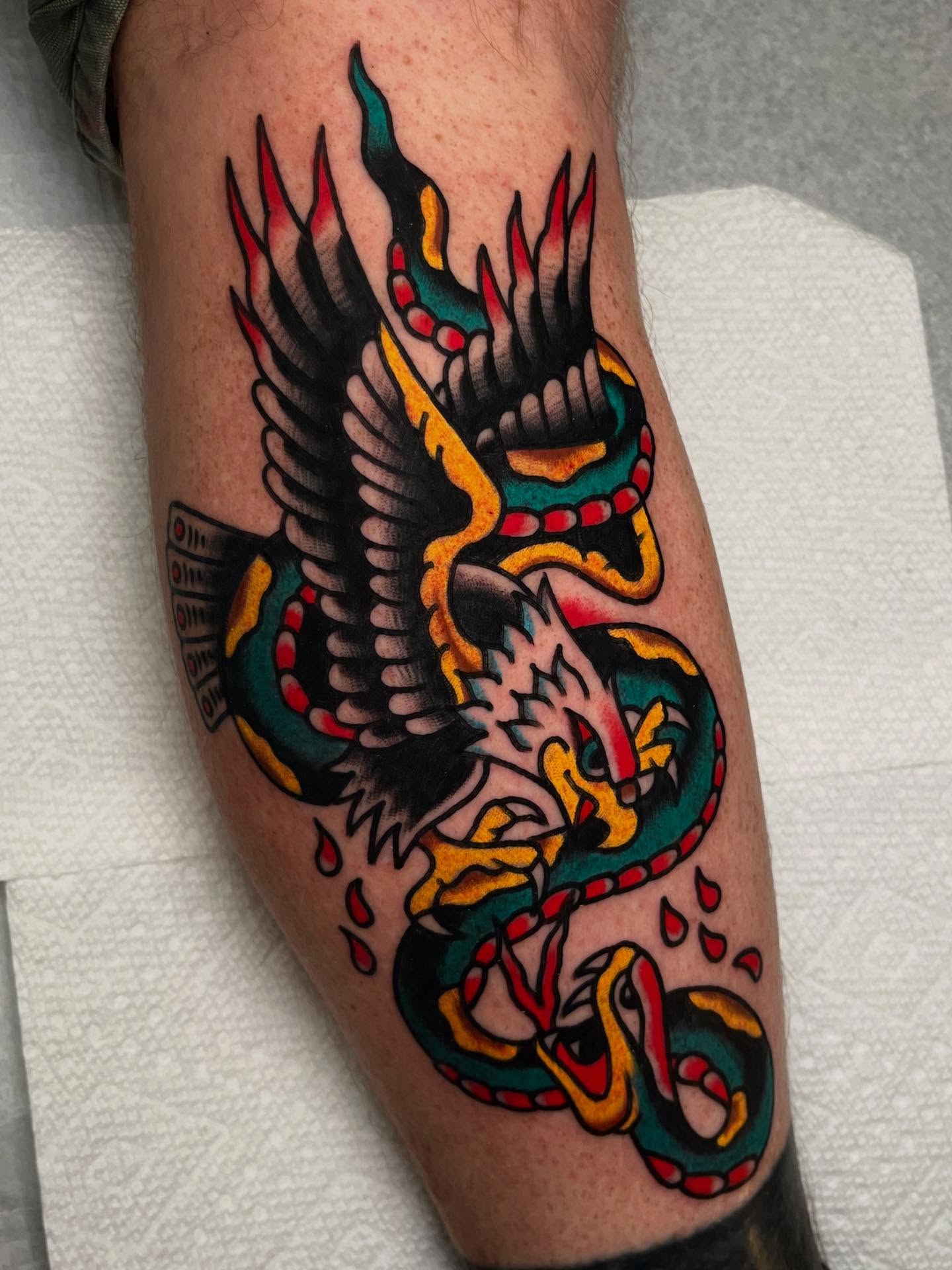 Dragon American traditional tattoo on the forearm by Rizzo