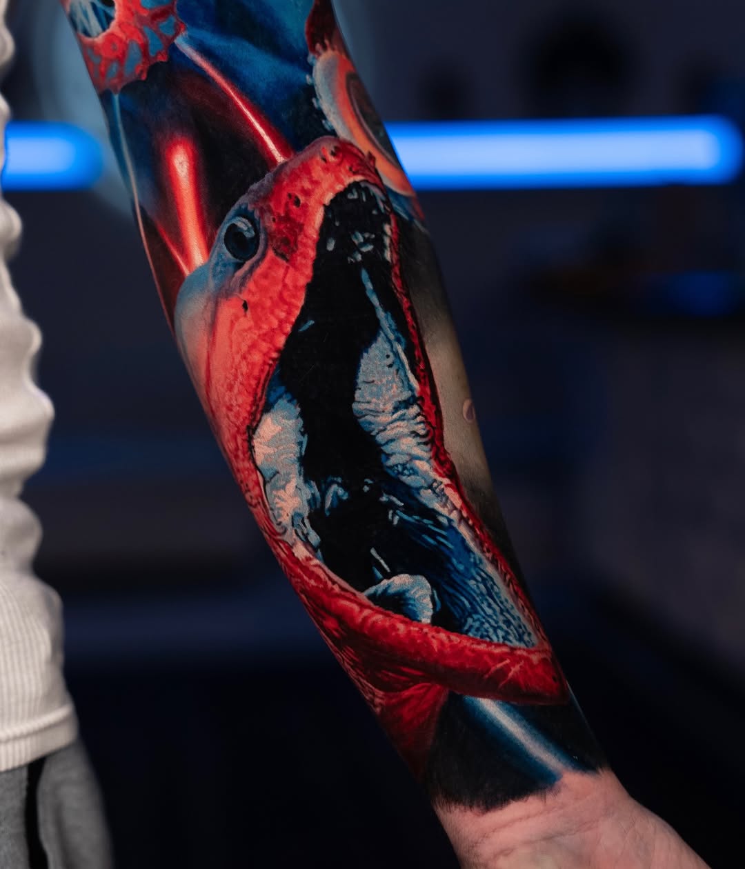 Monster mouth with laser beams biomech tattoo on the forearm by B R A D C H A R L e S
