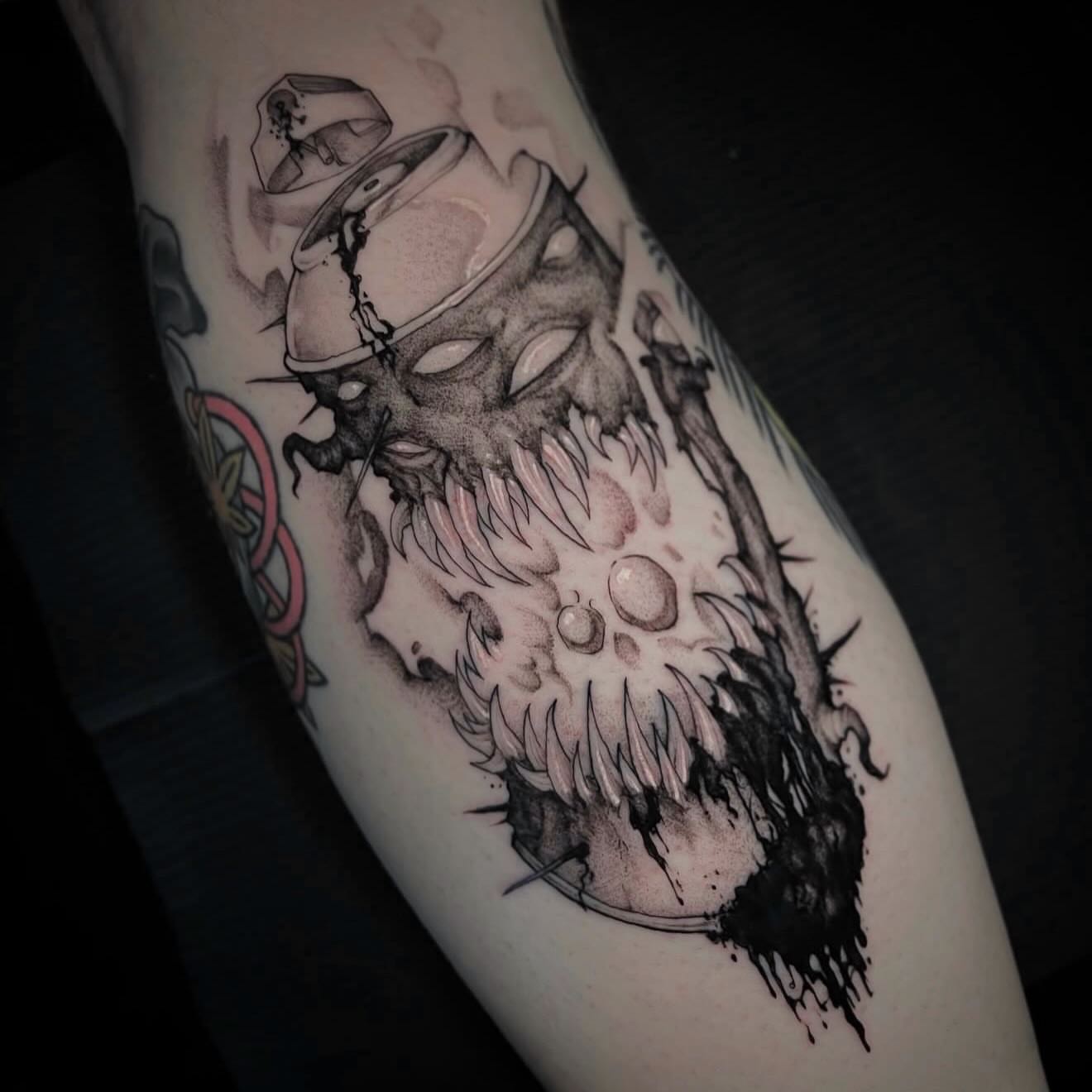 Bearded man with spray can black and grey tattoo on the forearm by Xavi Xiva TATTOO
