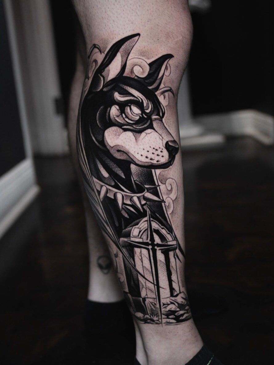 Dog black and grey tattoo on the forearm by CRISTIAN AMORES シ