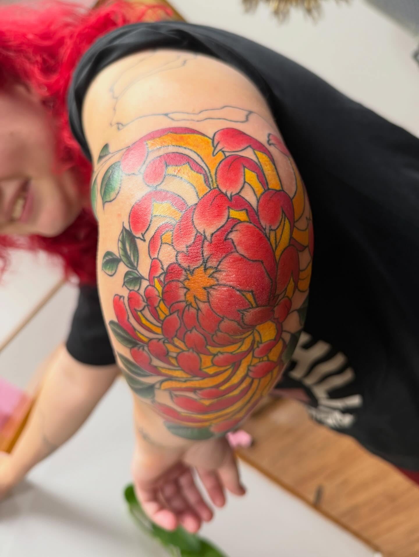 Chrysanthemum new school tattoo on the thigh by McKenna Chalifoux
