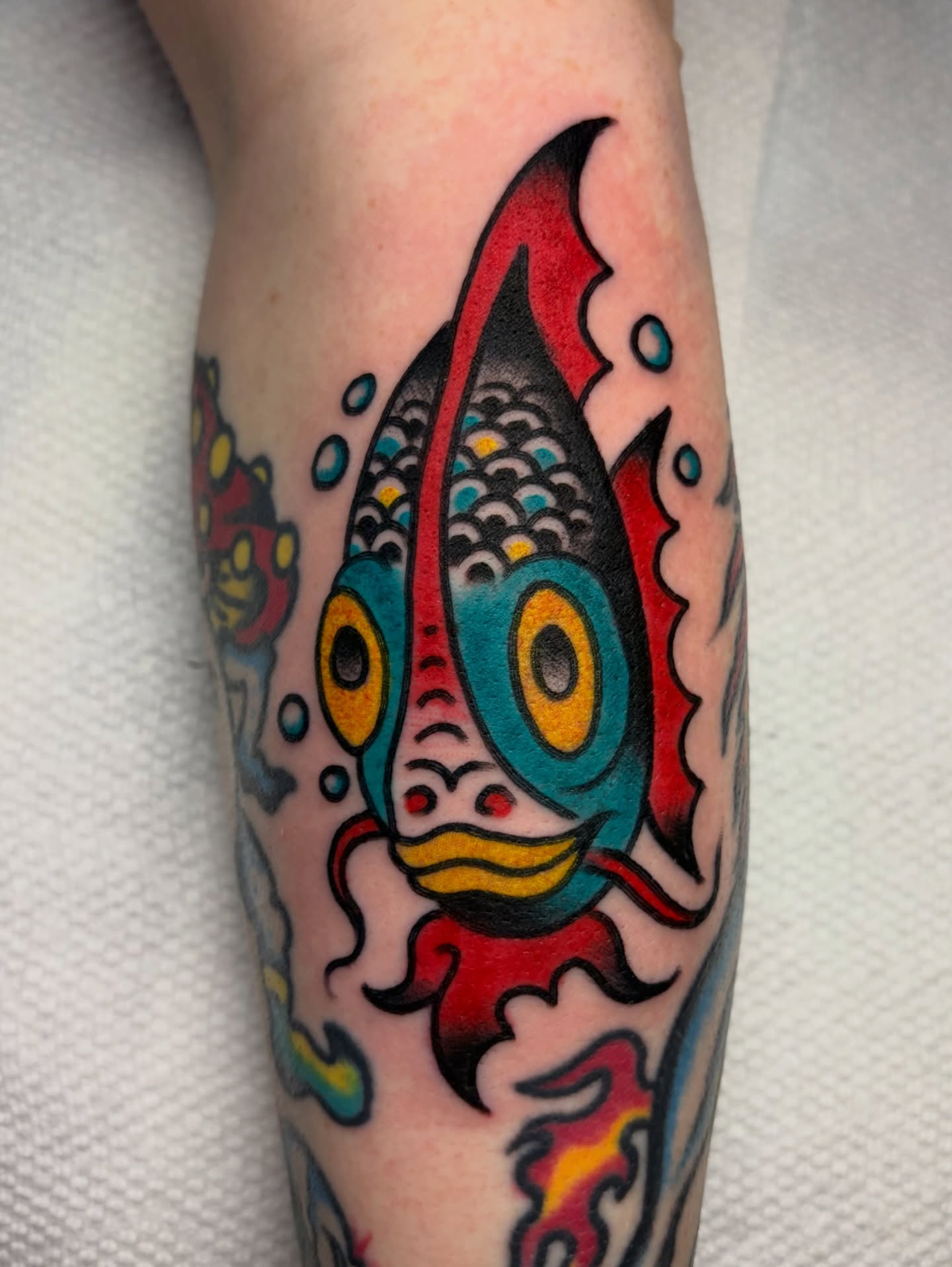 Fish American traditional tattoo on the forearm by David Armacost, Cincinnati, Ohio