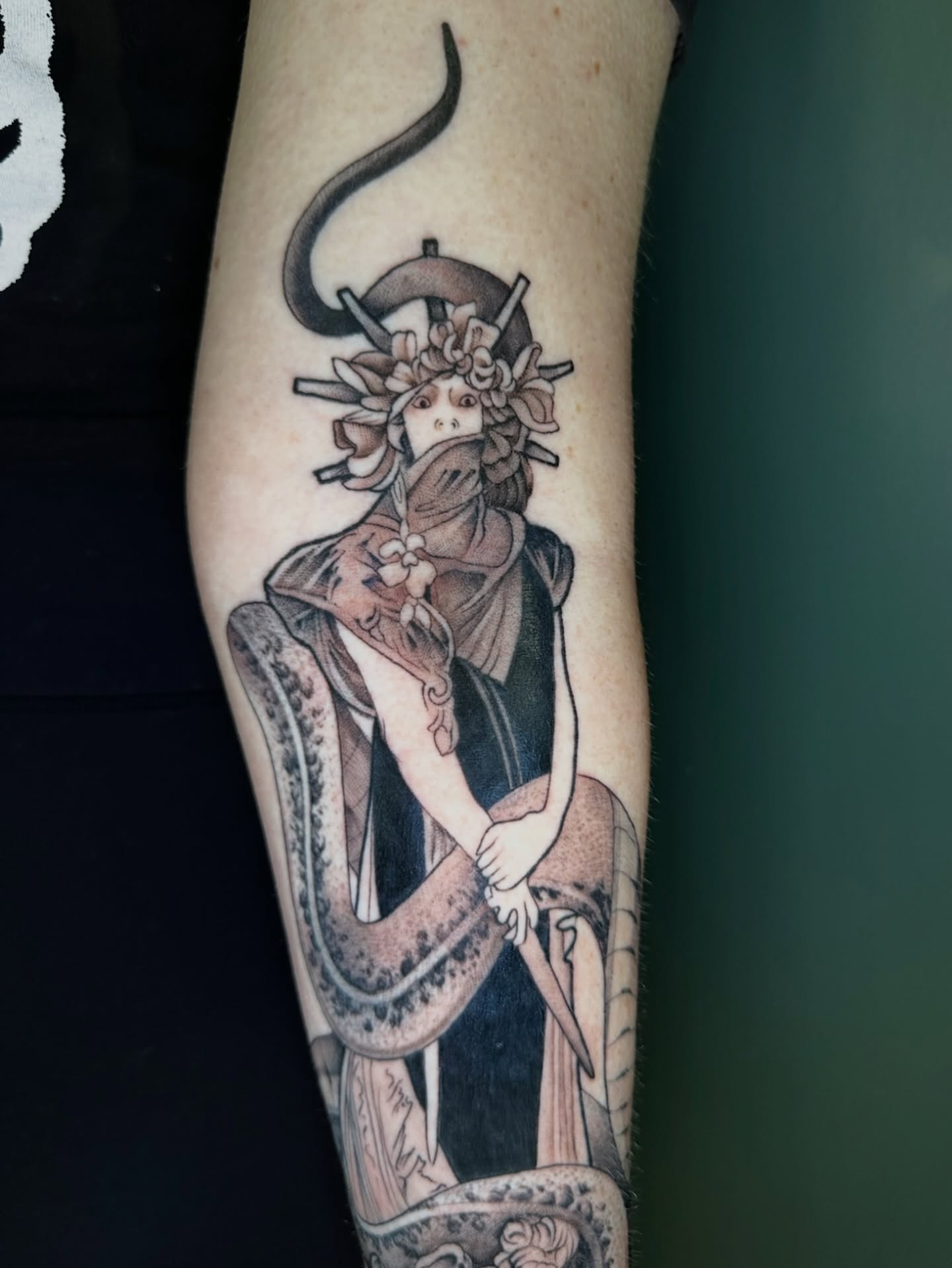 Geisha with snake japanese irezumi tattoo on the forearm by Sarah Margaret