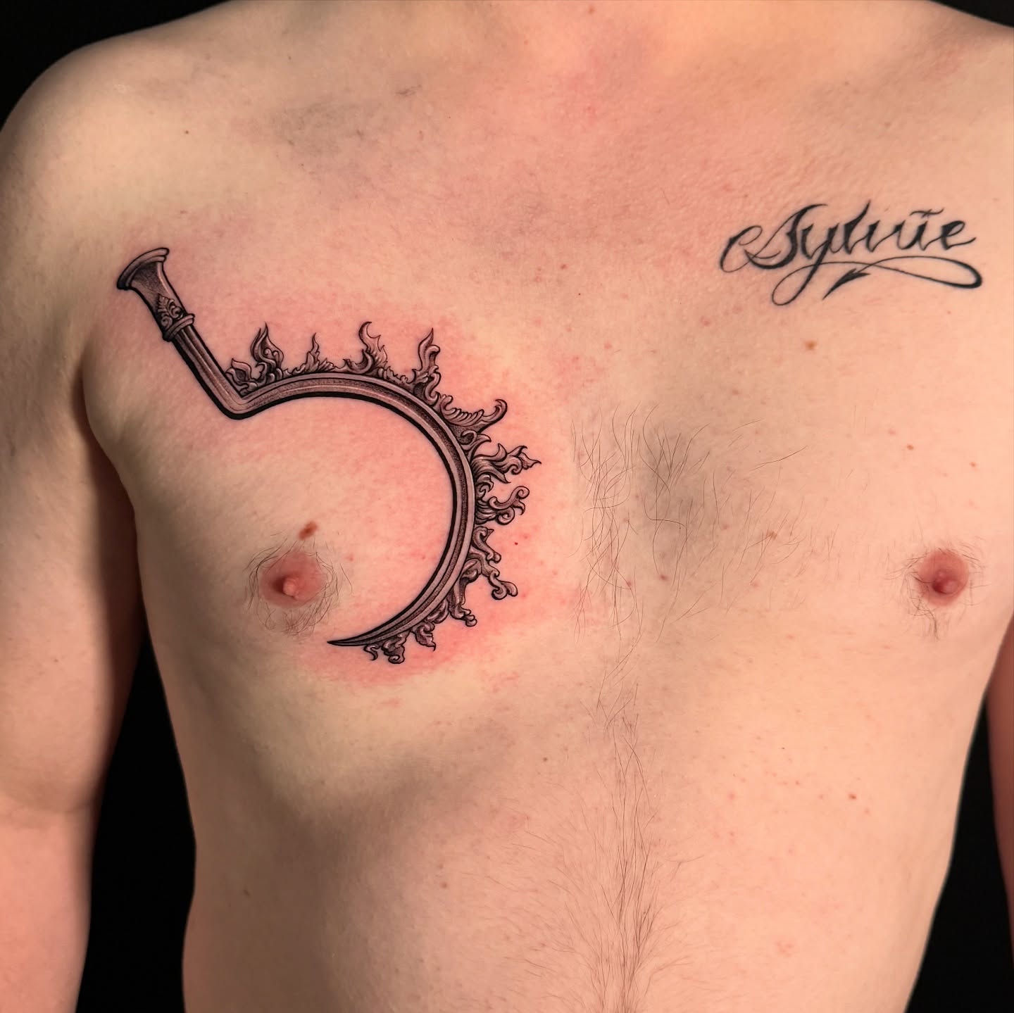 Crescent moon ornamental tattoo on the chest by HAiZiE
