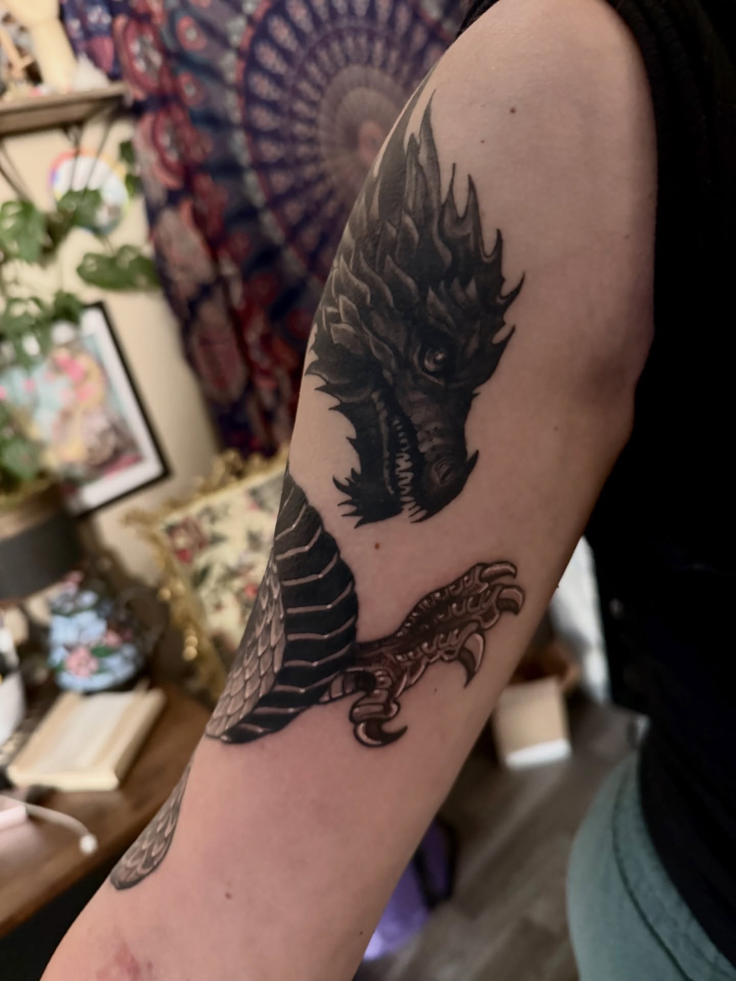 Dragon black and grey tattoo on the forearm by Ashley Laine Evans