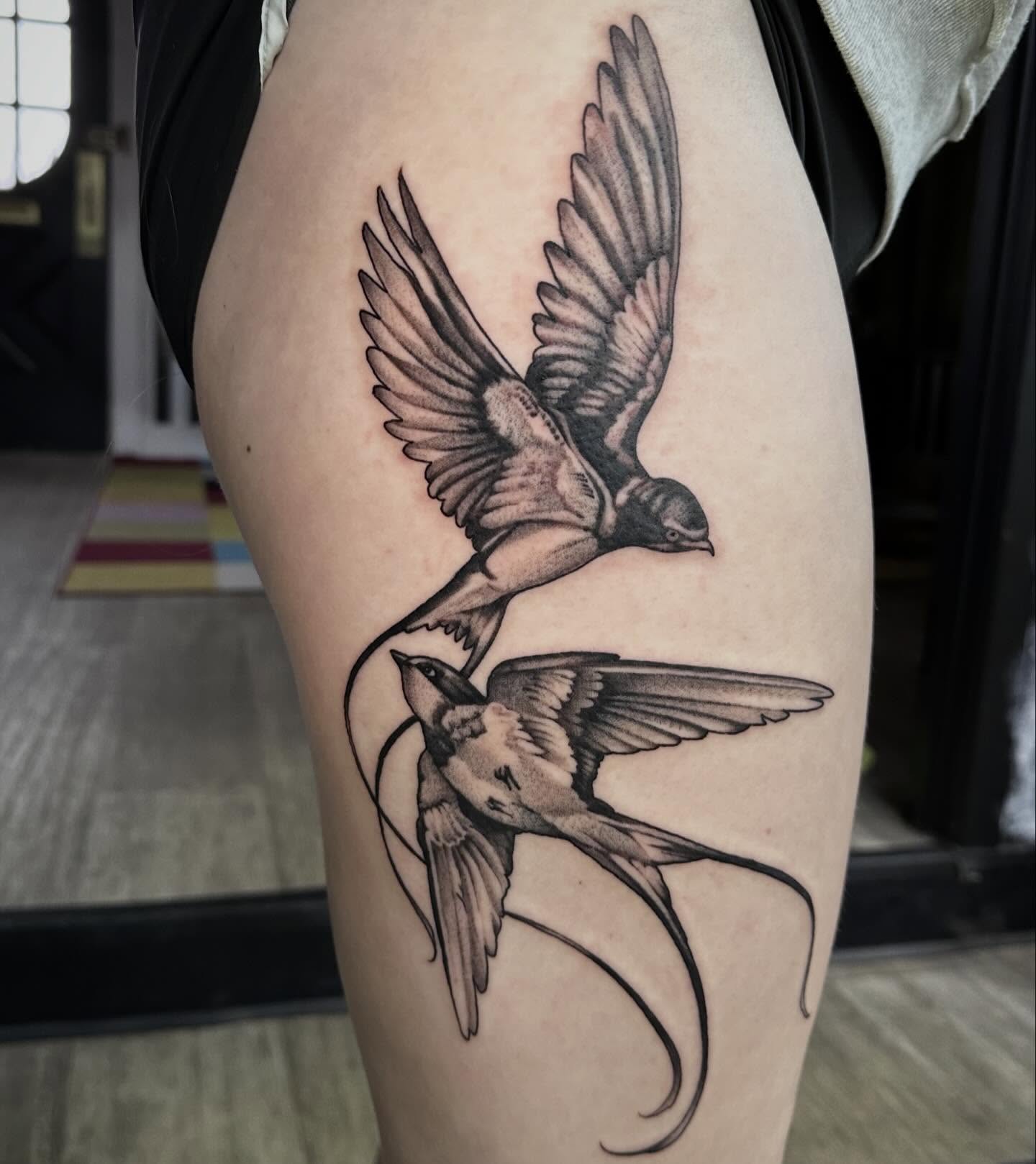 Swallows realism tattoo on the thigh by Dustin Clark, Dayton, Ohio