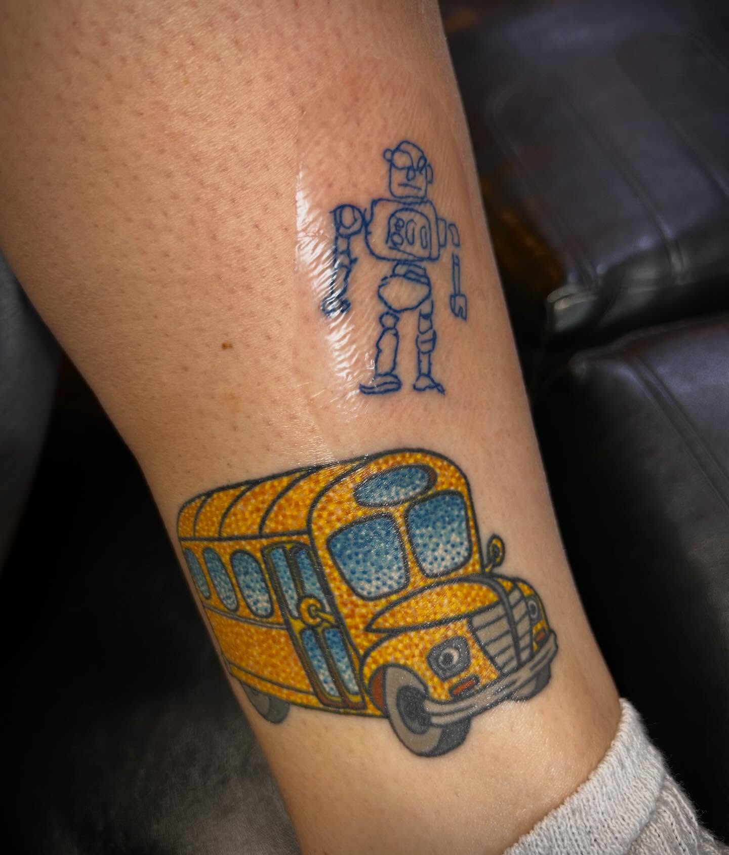 School bus and robot dotwork tattoo on the forearm by Hailey Aka inkbunni, Detroit, Michigan