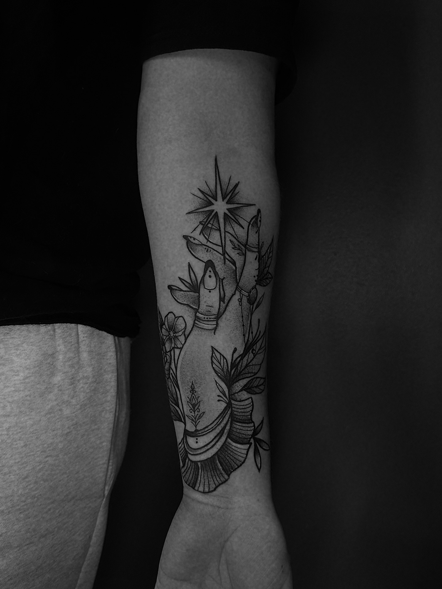Bird and floral black and grey tattoo on the forearm by E L I Z A H B e T H H D e S I G N S