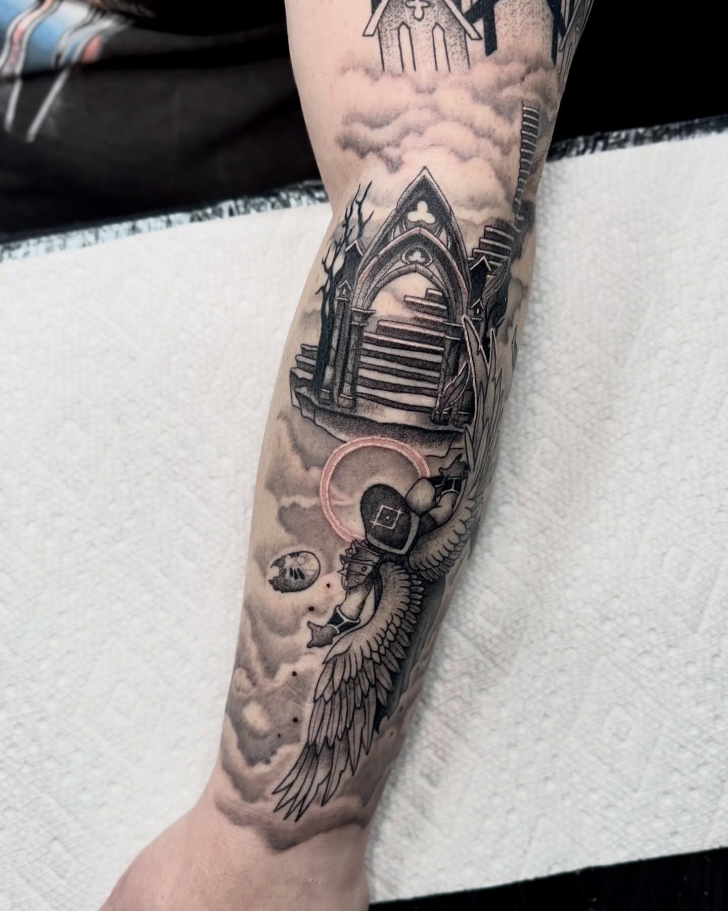 Gothic architecture realism tattoo on the forearm by Eden Allen