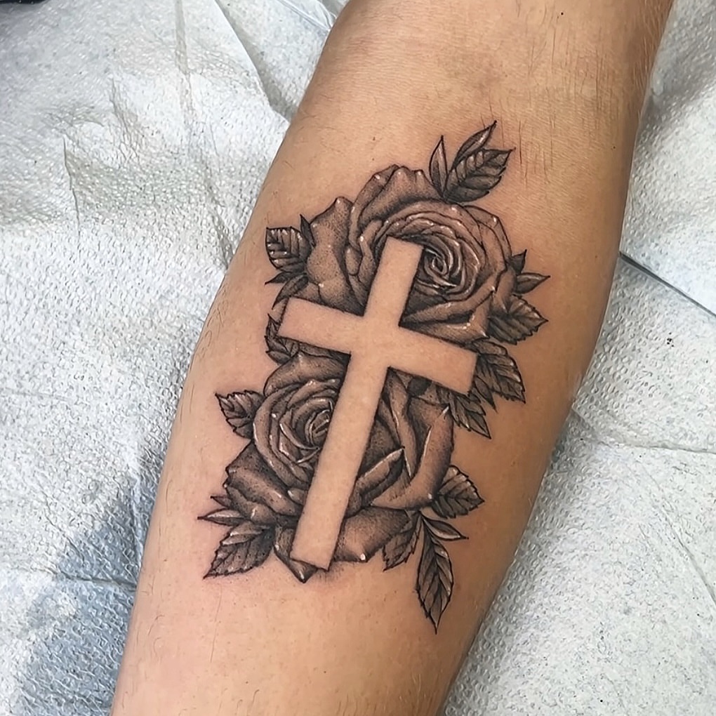 Cross and roses black and grey tattoo on the forearm by ⚒dptattoos ⚒, East Williamsburg, Brooklyn