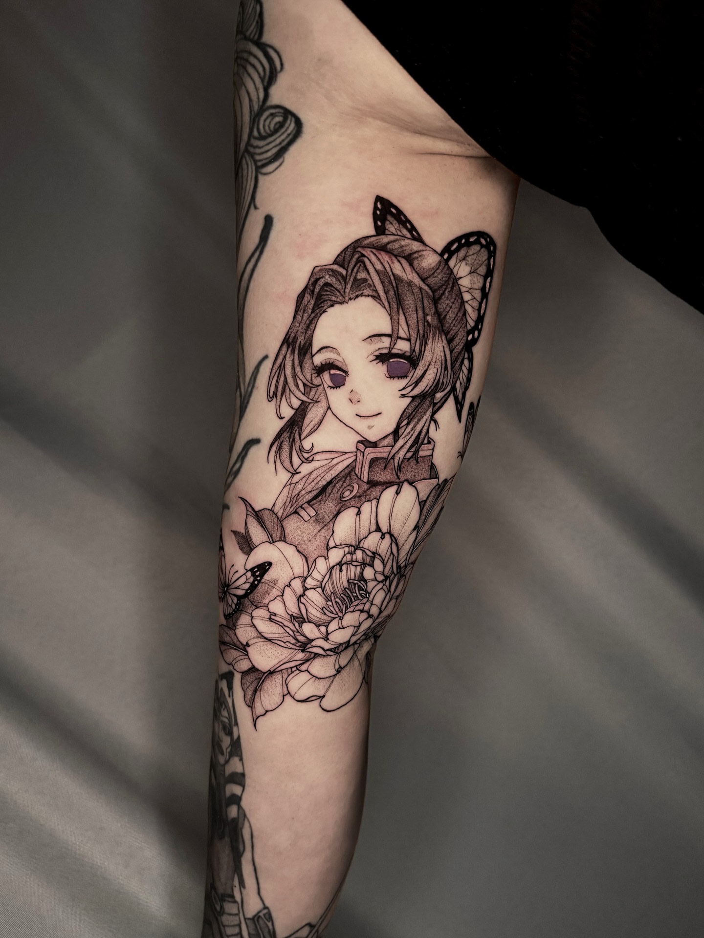 Tattoo by @gill_tattoos — anime, black_and_grey