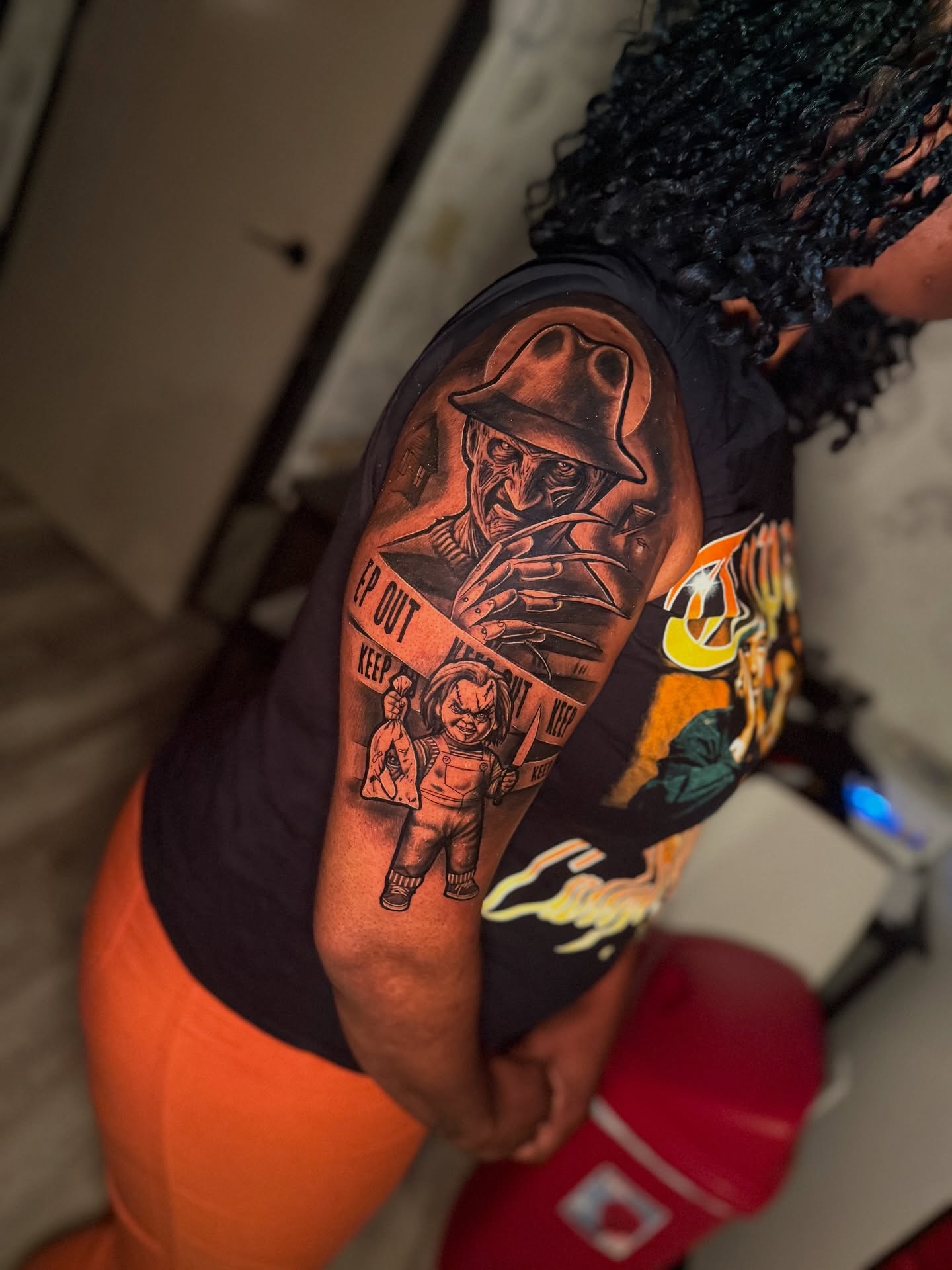 Horror movie characters realism tattoo on the upper arm by Atlanta Tattoo Artist