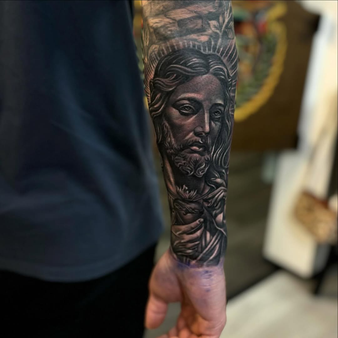 Jesus Christ portrait realism tattoo on the forearm by ๐๐๐๐๐๐๐ ๐ฌ.๐ผ