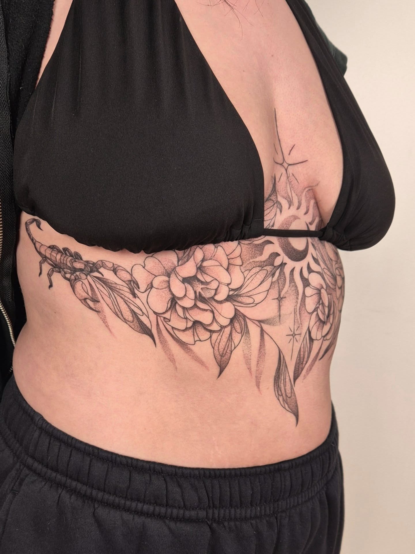 Scorpion and flowers dotwork tattoo on the torso by Sophorn Long (soapy)