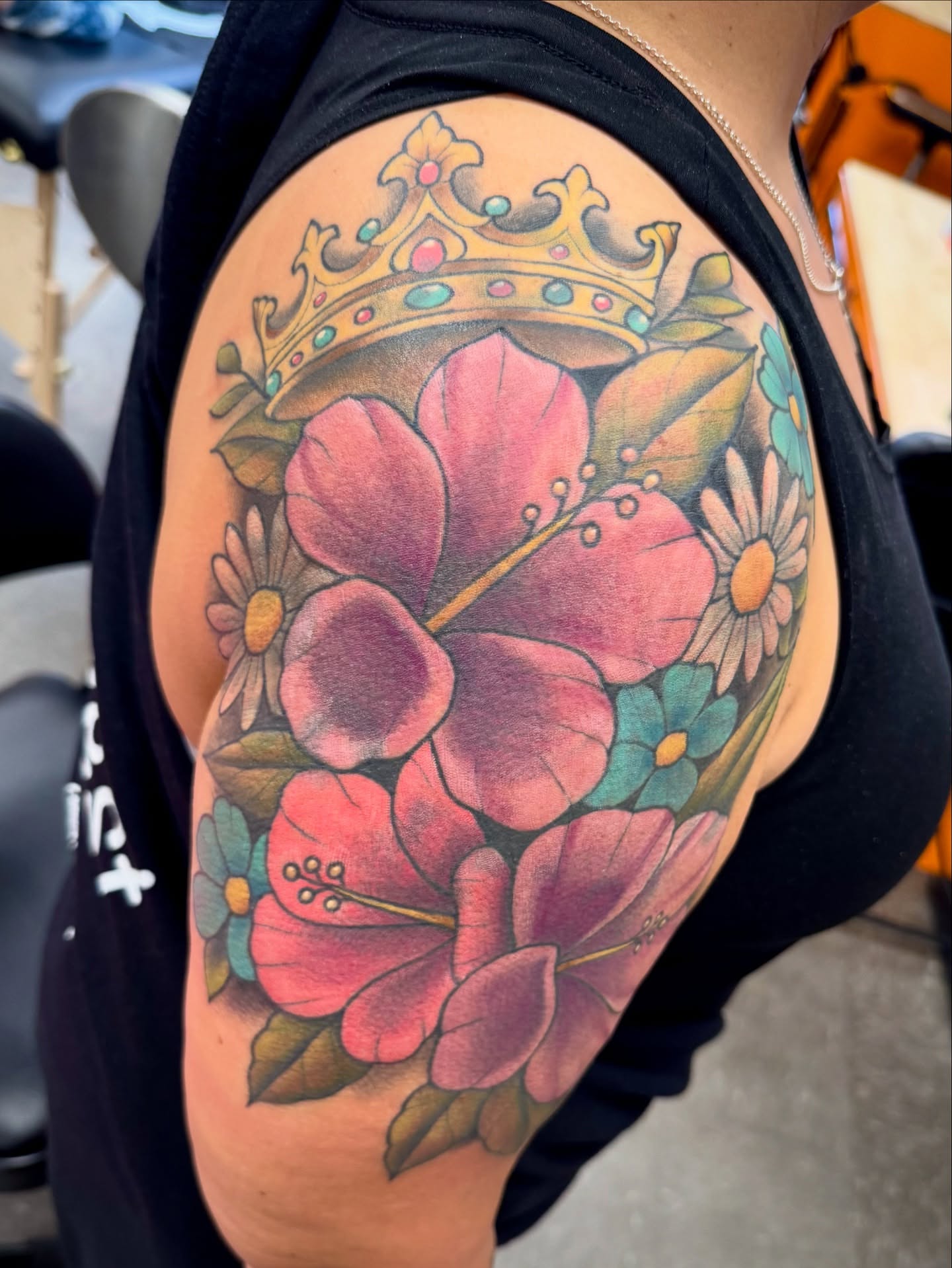 Floral crown American traditional tattoo on the shoulder by Samantha Jane