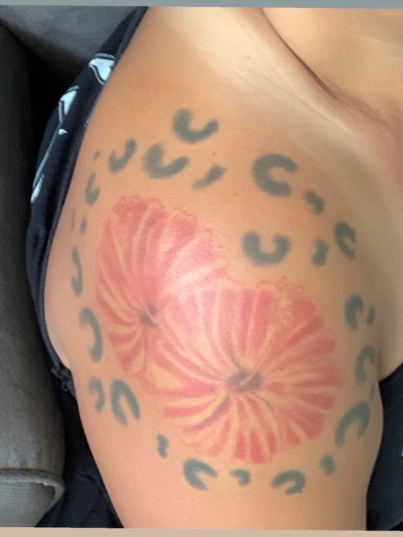 Flower dotwork tattoo on the shoulder by Samantha Jane