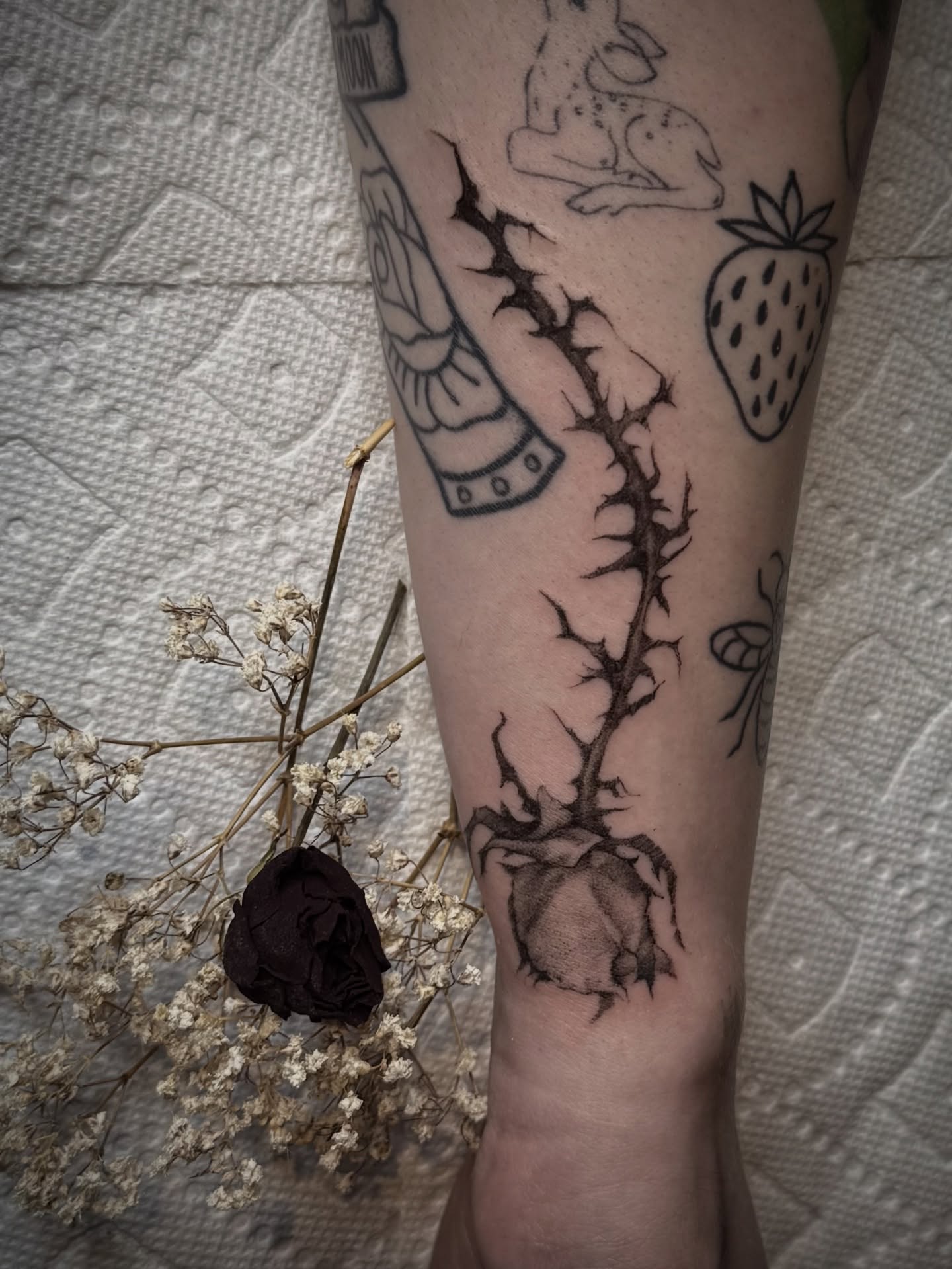 Thorned rose black and grey tattoo on the forearm by Jamie Draven 🐺
