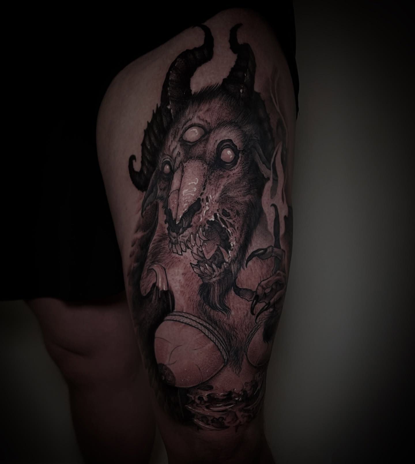 Demon dark realism tattoo on the thigh by Xavi Xiva TATTOO