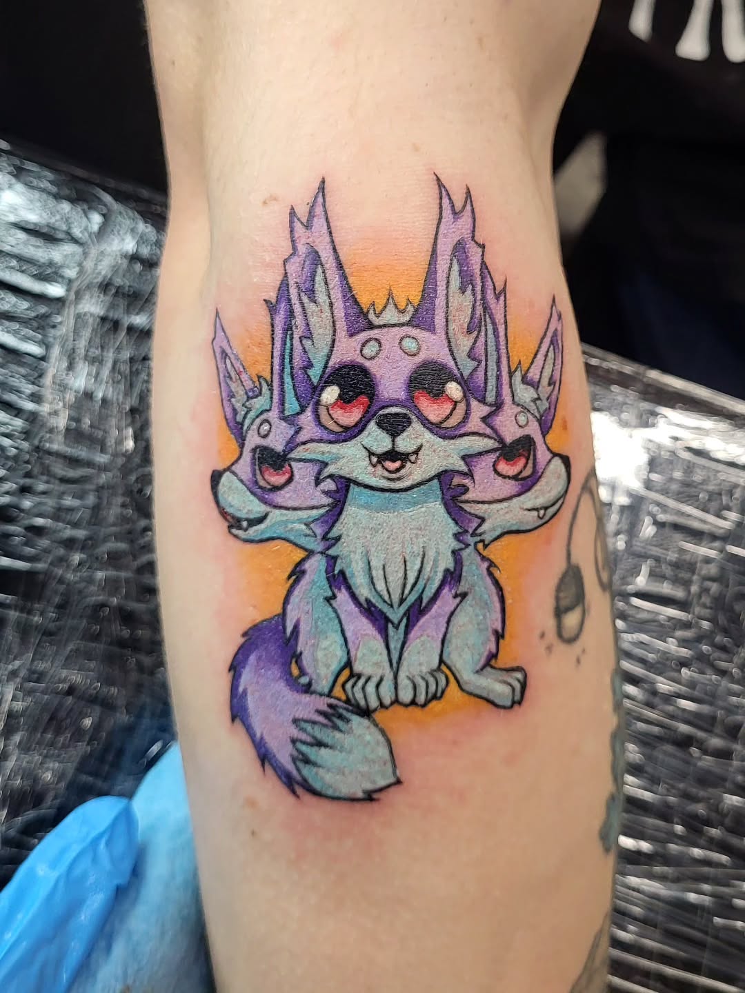 Three-headed creature new school tattoo on the forearm by TEA ☕️ Tattoos
