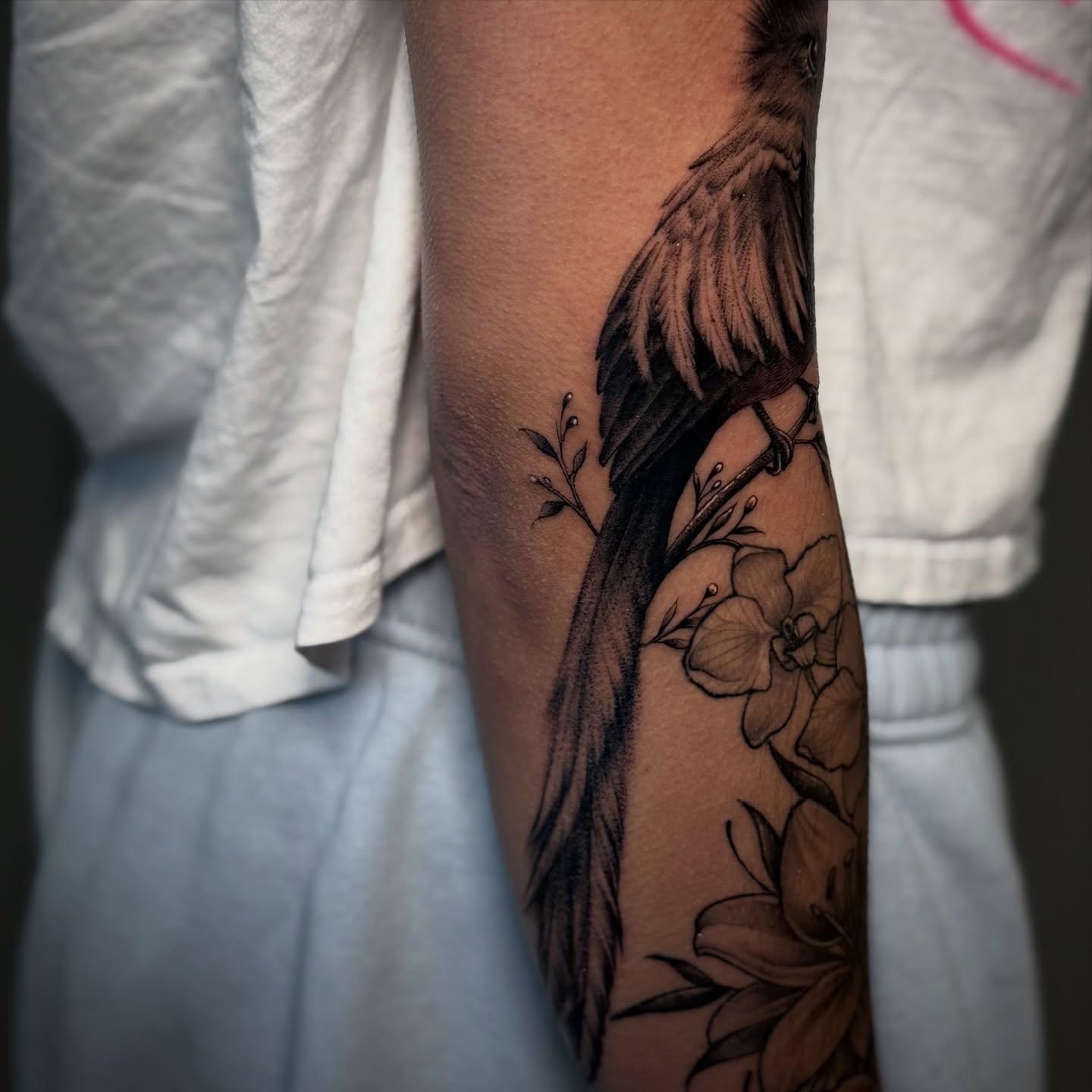 Bird and flowers realism tattoo on the forearm by π·ππ