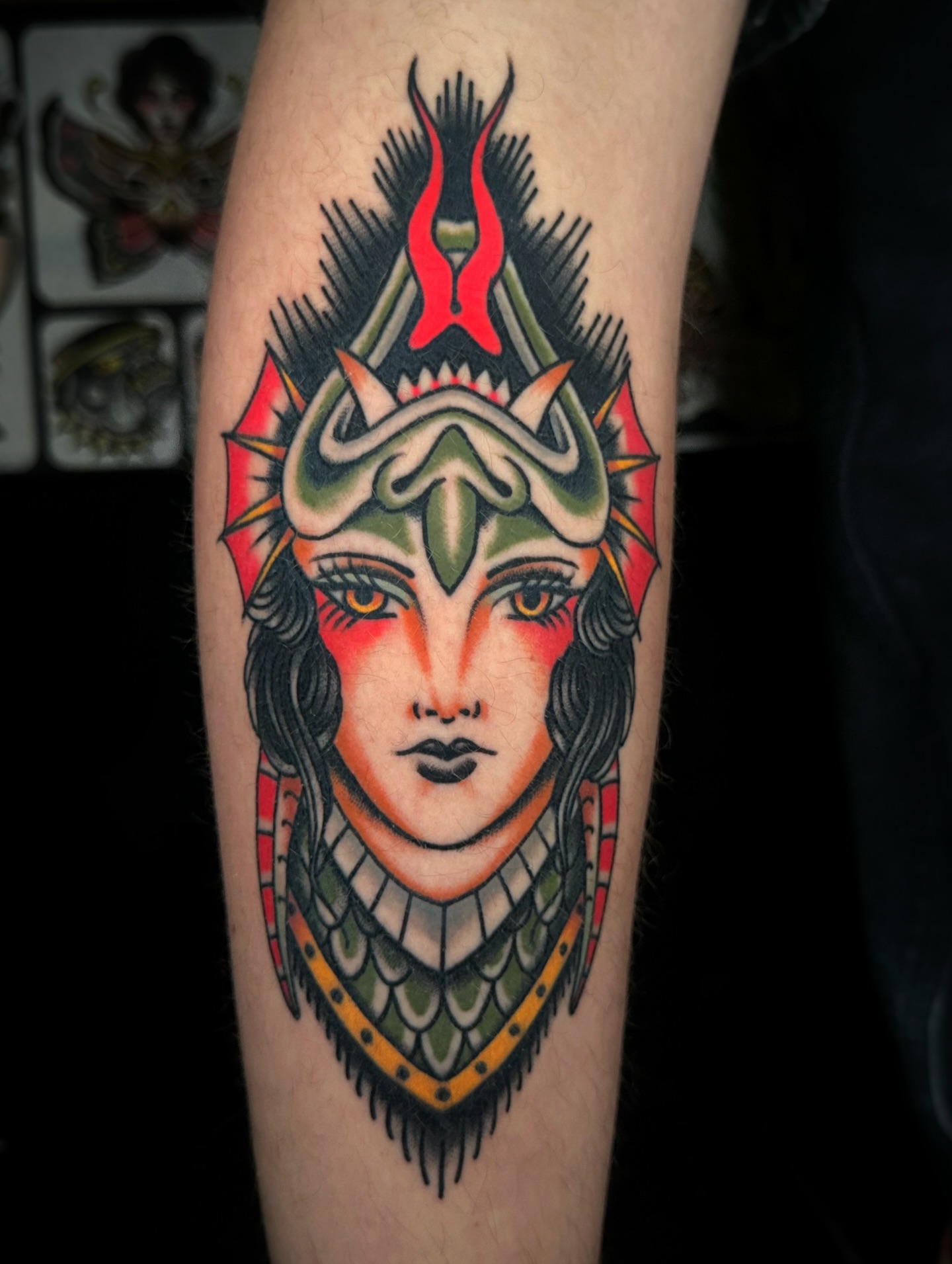Warrior mask American traditional tattoo on the forearm by Alex Finnerty, Reading, Massachusetts