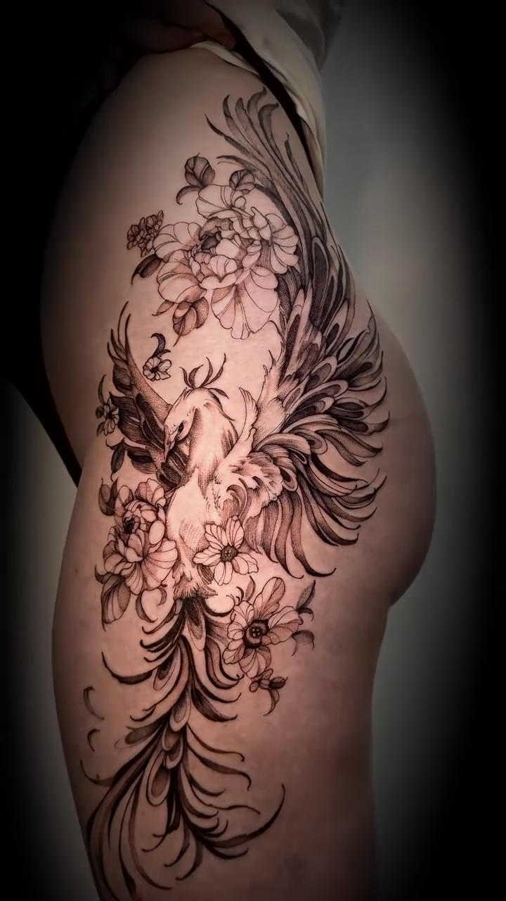 Floral phoenix with flowing feathers watercolor tattoo on the shoulder by Nyc Tattoo Manhattan